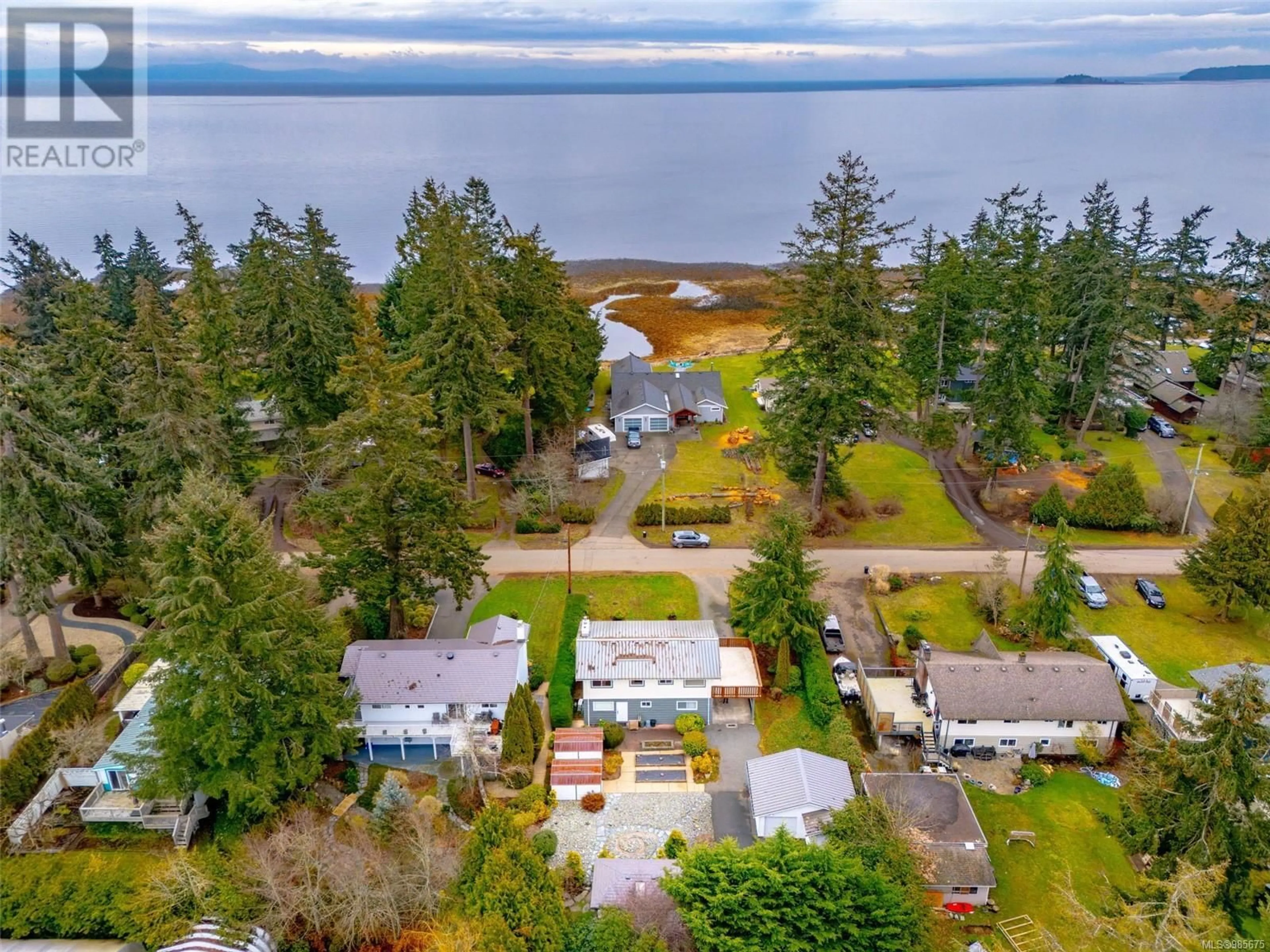 A pic from outside/outdoor area/front of a property/back of a property/a pic from drone, water/lake/river/ocean view for 4101 Gartley Point Rd, Courtenay British Columbia V9N9T2