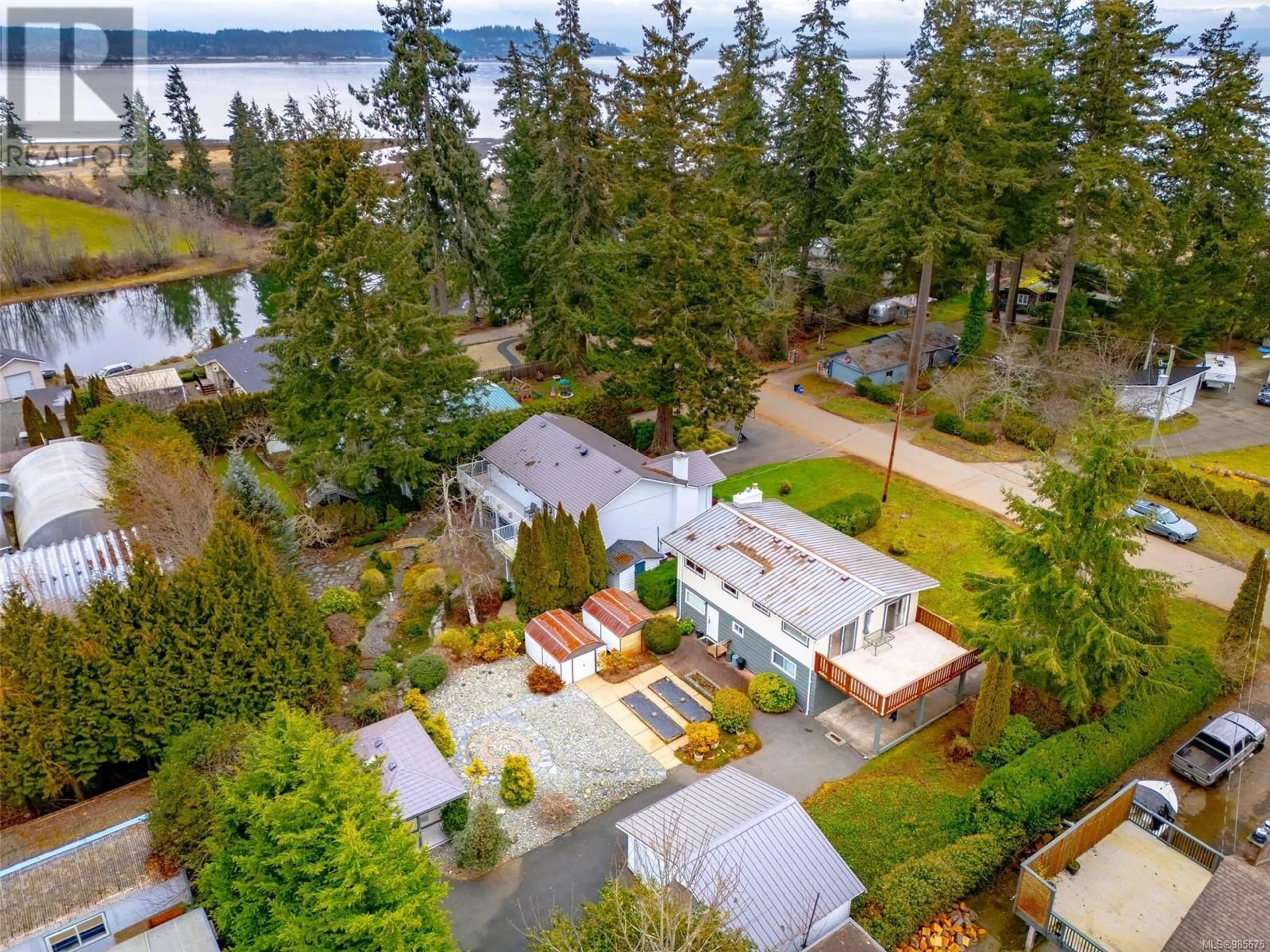 A pic from outside/outdoor area/front of a property/back of a property/a pic from drone, water/lake/river/ocean view for 4101 Gartley Point Rd, Courtenay British Columbia V9N9T2