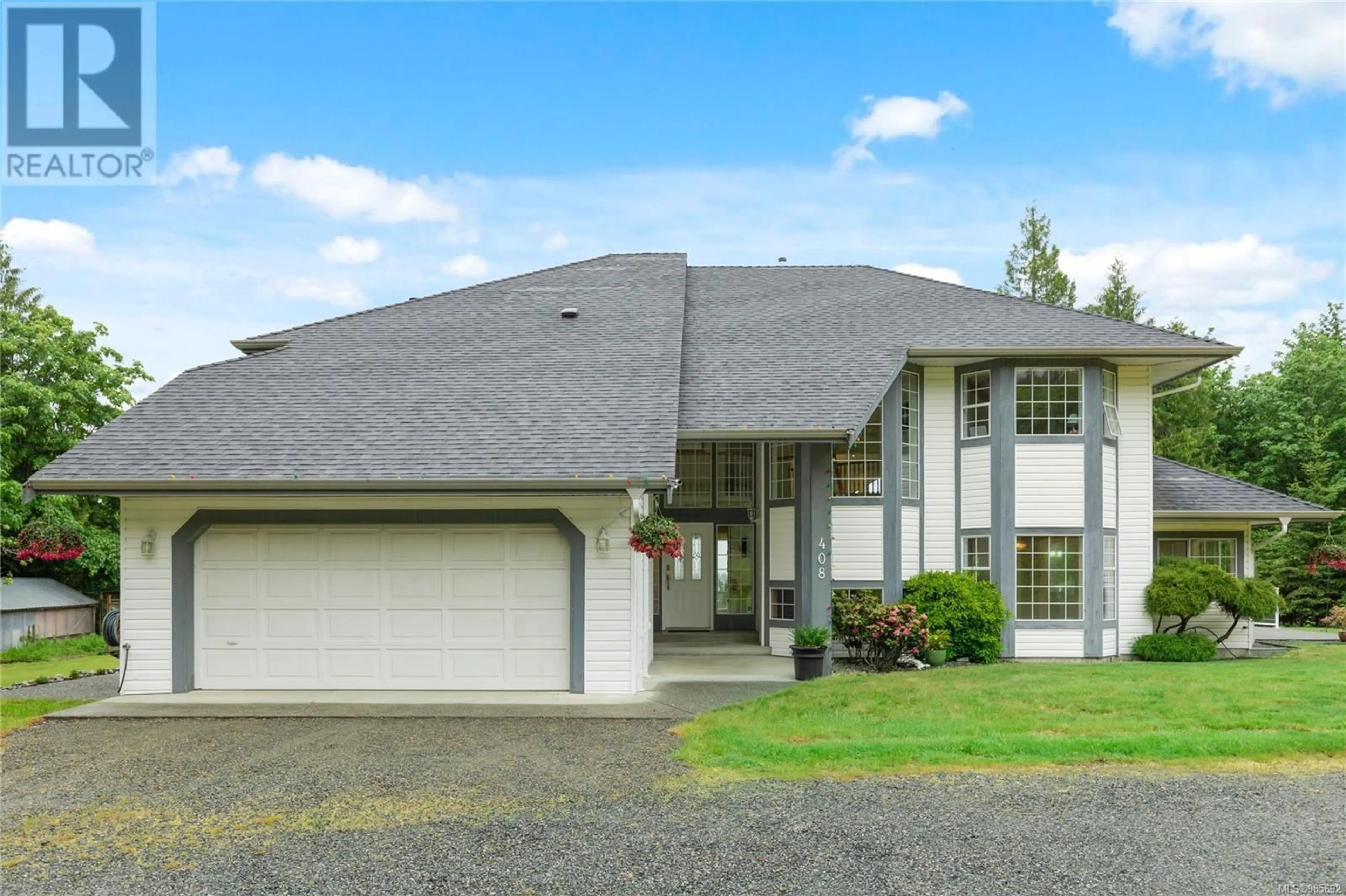 Home with vinyl exterior material, street for 408 Hall Rd, Ladysmith British Columbia V9G1V8