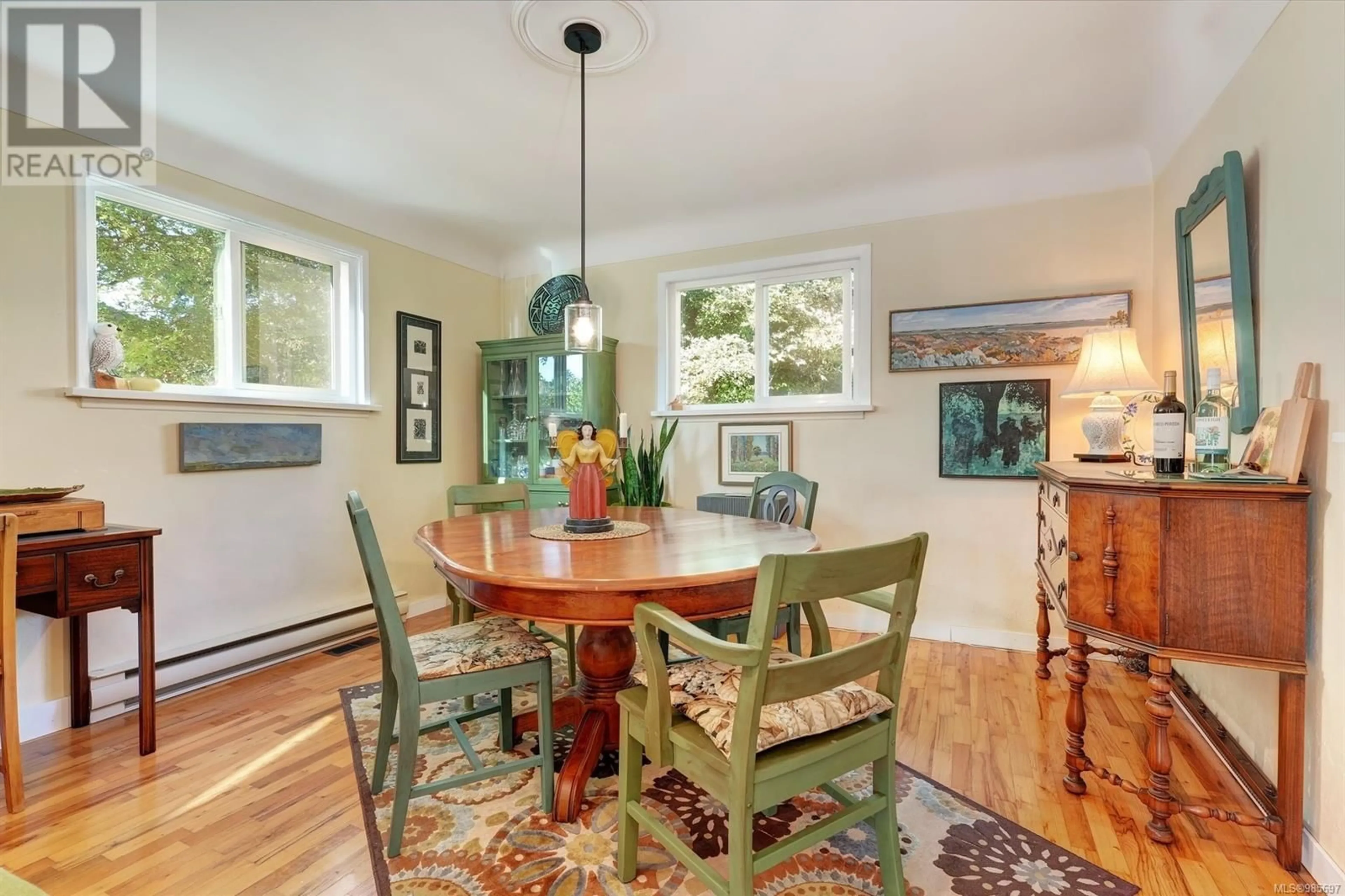 Dining room, wood/laminate floor for 3910 Wilkinson Rd, Saanich British Columbia V8Z5A2