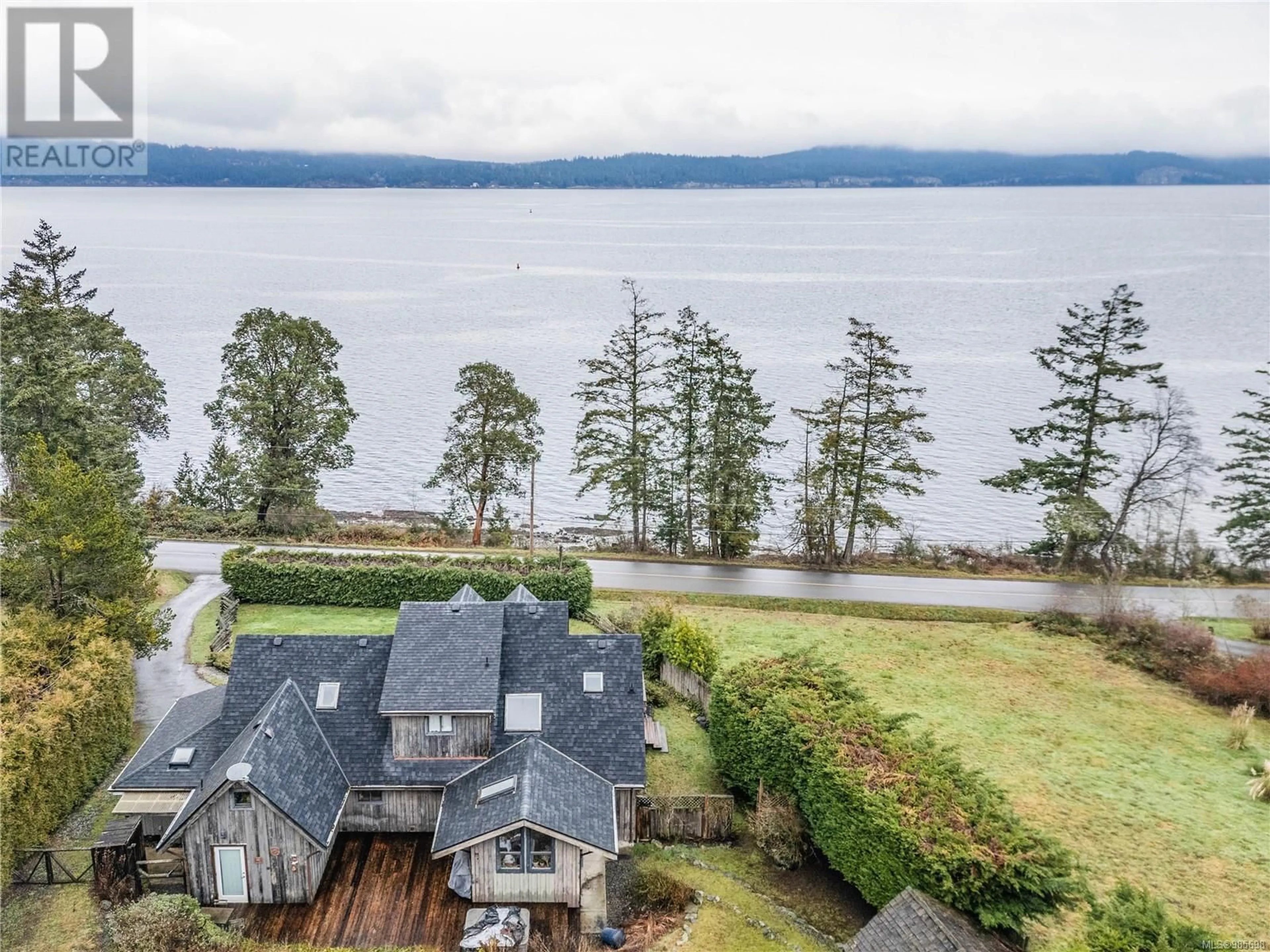 A pic from outside/outdoor area/front of a property/back of a property/a pic from drone, water/lake/river/ocean view for 970 Walkers Hook Rd, Salt Spring British Columbia V8K1B5