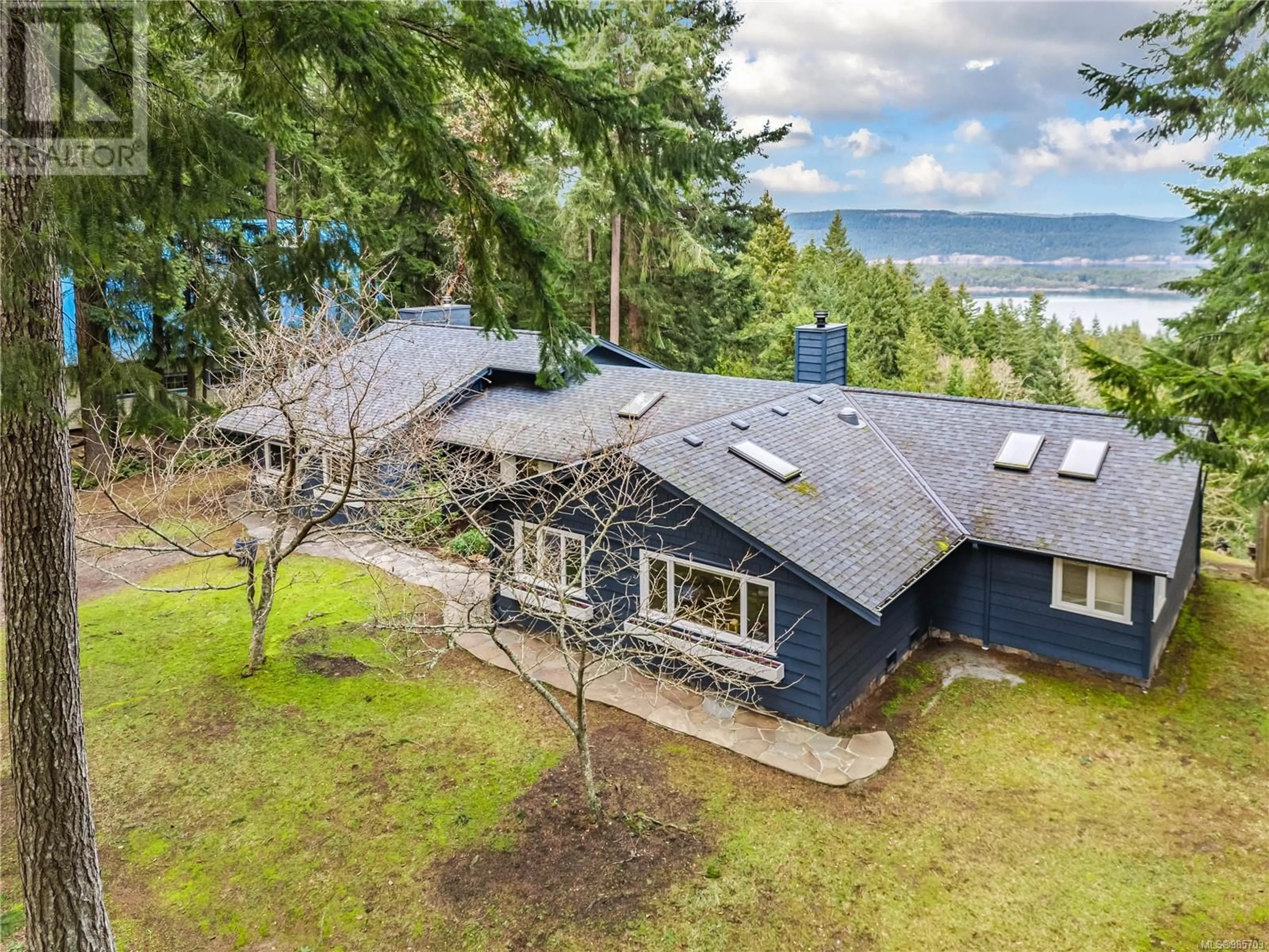 A pic from outside/outdoor area/front of a property/back of a property/a pic from drone, water/lake/river/ocean view for 112 SUNEAGLE DRIVE, Salt Spring British Columbia V8K1E5