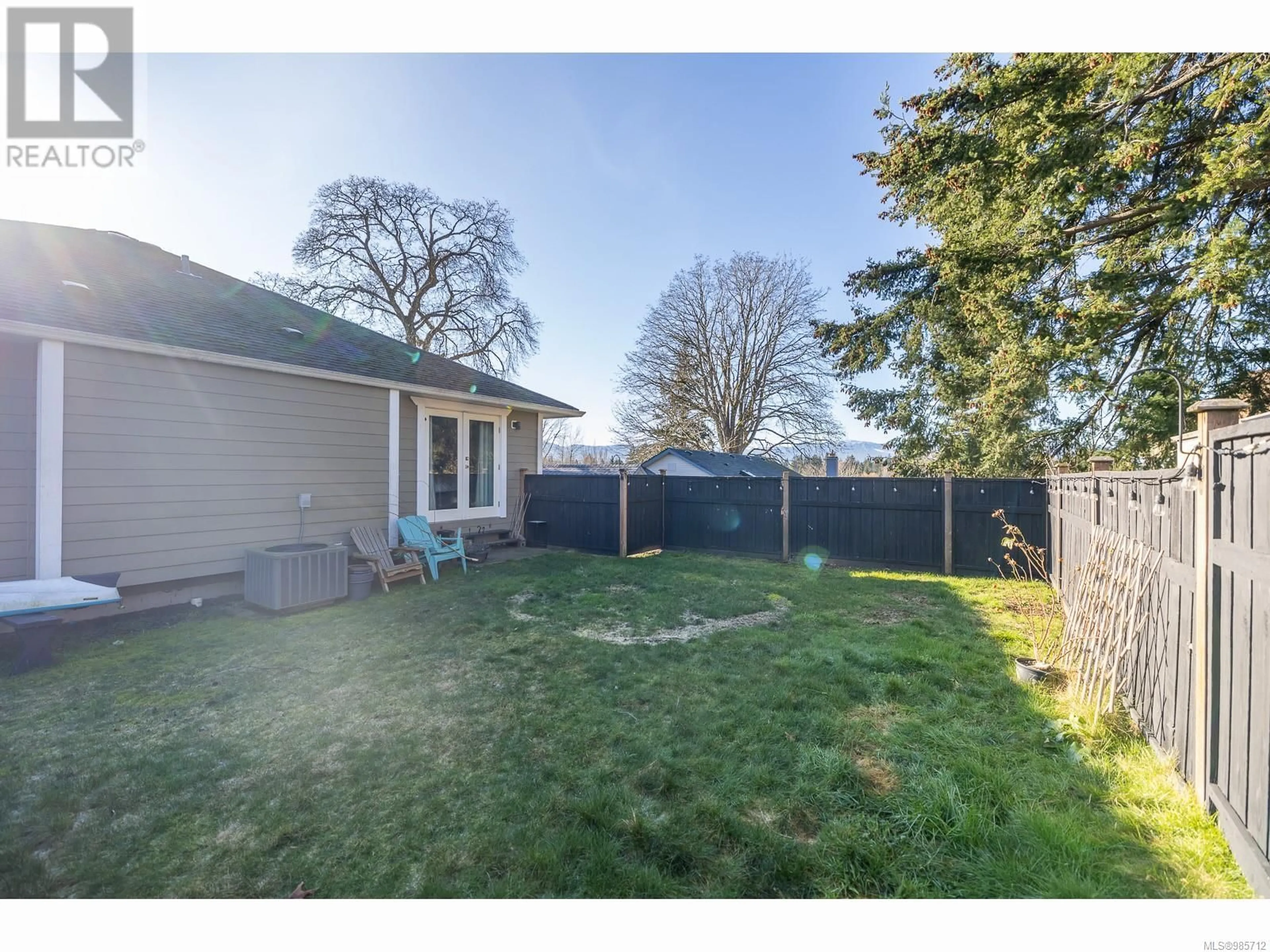 A pic from outside/outdoor area/front of a property/back of a property/a pic from drone, street for 1426 NOEL Ave, Comox British Columbia V9M3C6