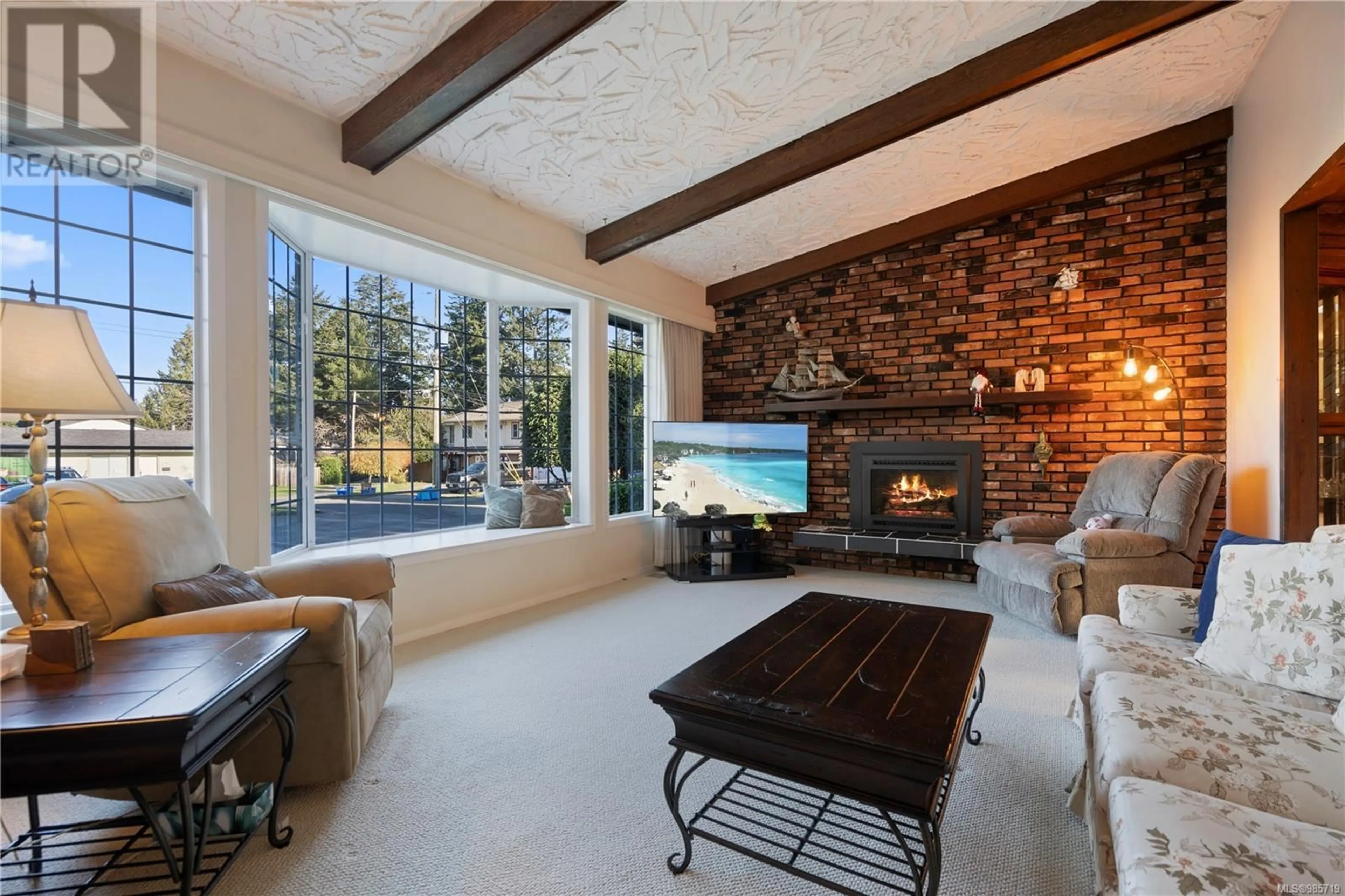 Living room with furniture, ceramic/tile floor for 3129 Lynnlark Pl, Colwood British Columbia V9B1Z4