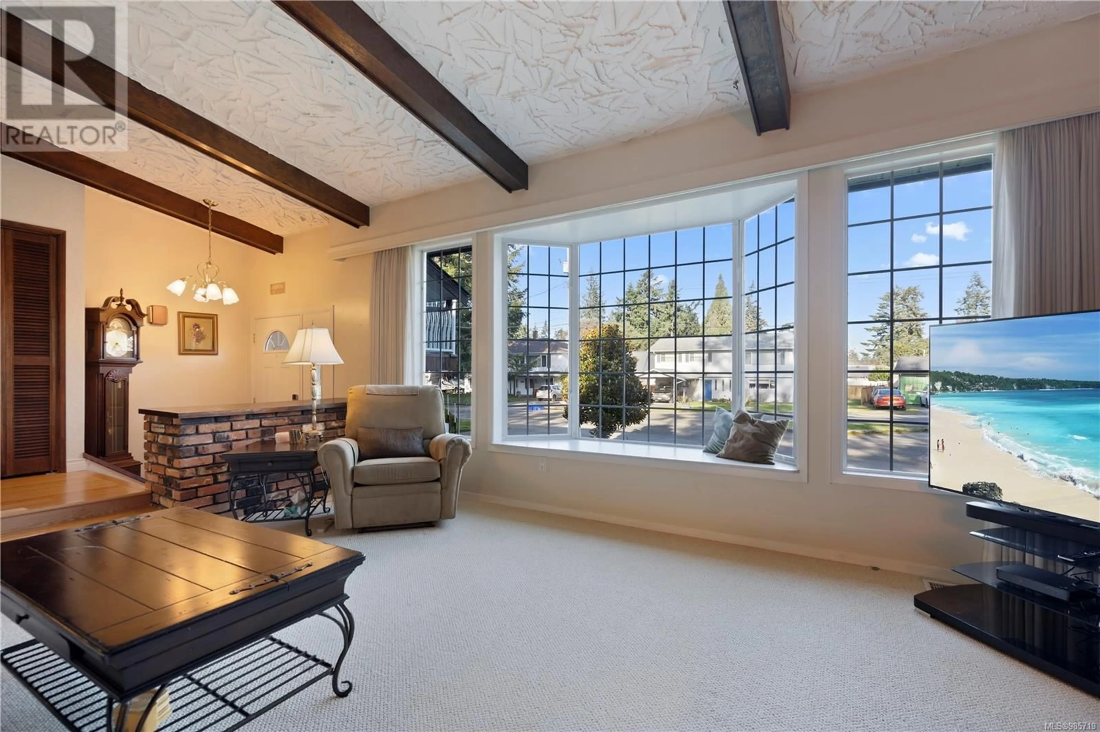 Living room with furniture, ceramic/tile floor for 3129 Lynnlark Pl, Colwood British Columbia V9B1Z4