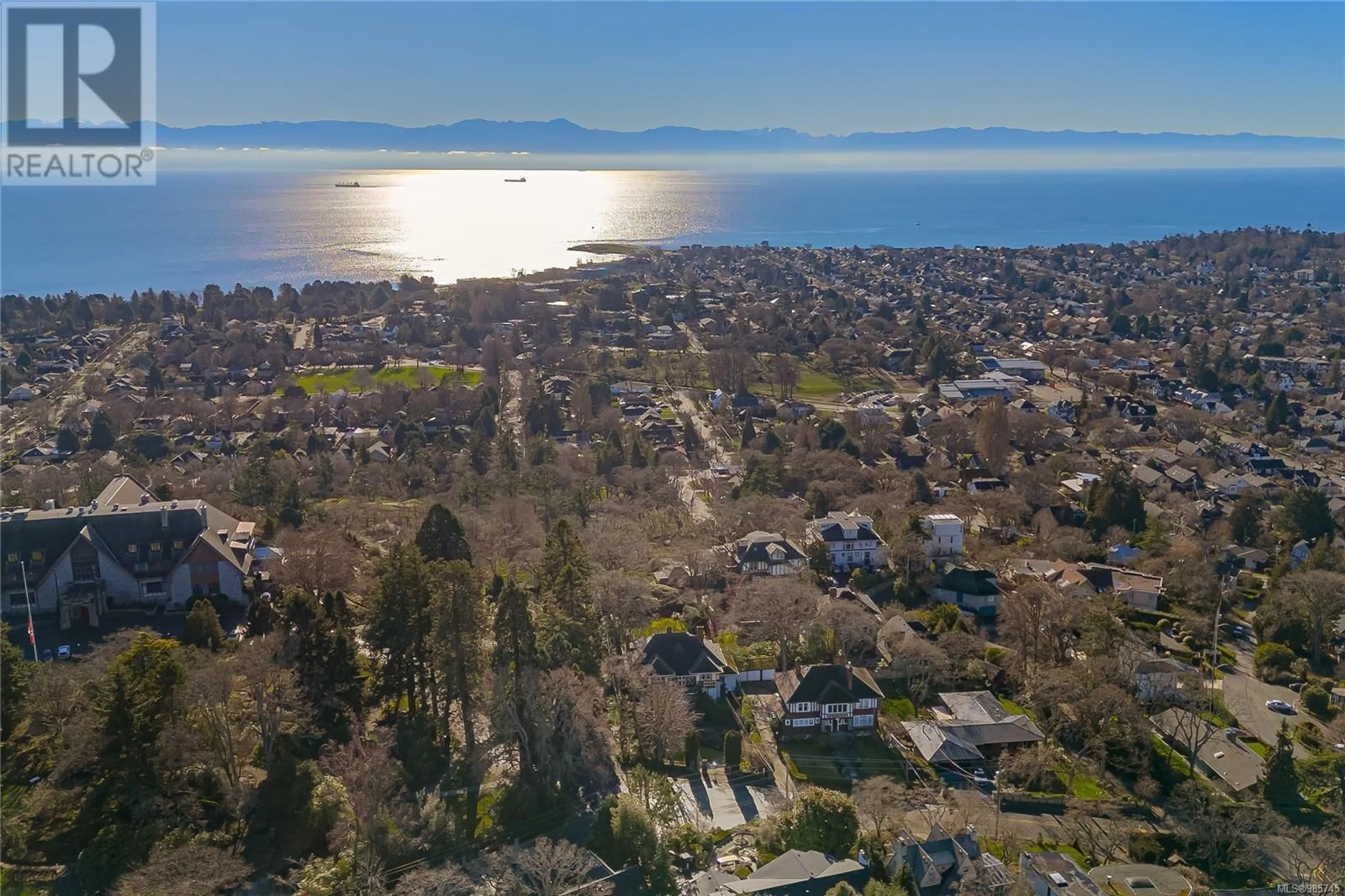 A pic from outside/outdoor area/front of a property/back of a property/a pic from drone, water/lake/river/ocean view for 1393 Rockland Ave, Victoria British Columbia V8S1V7