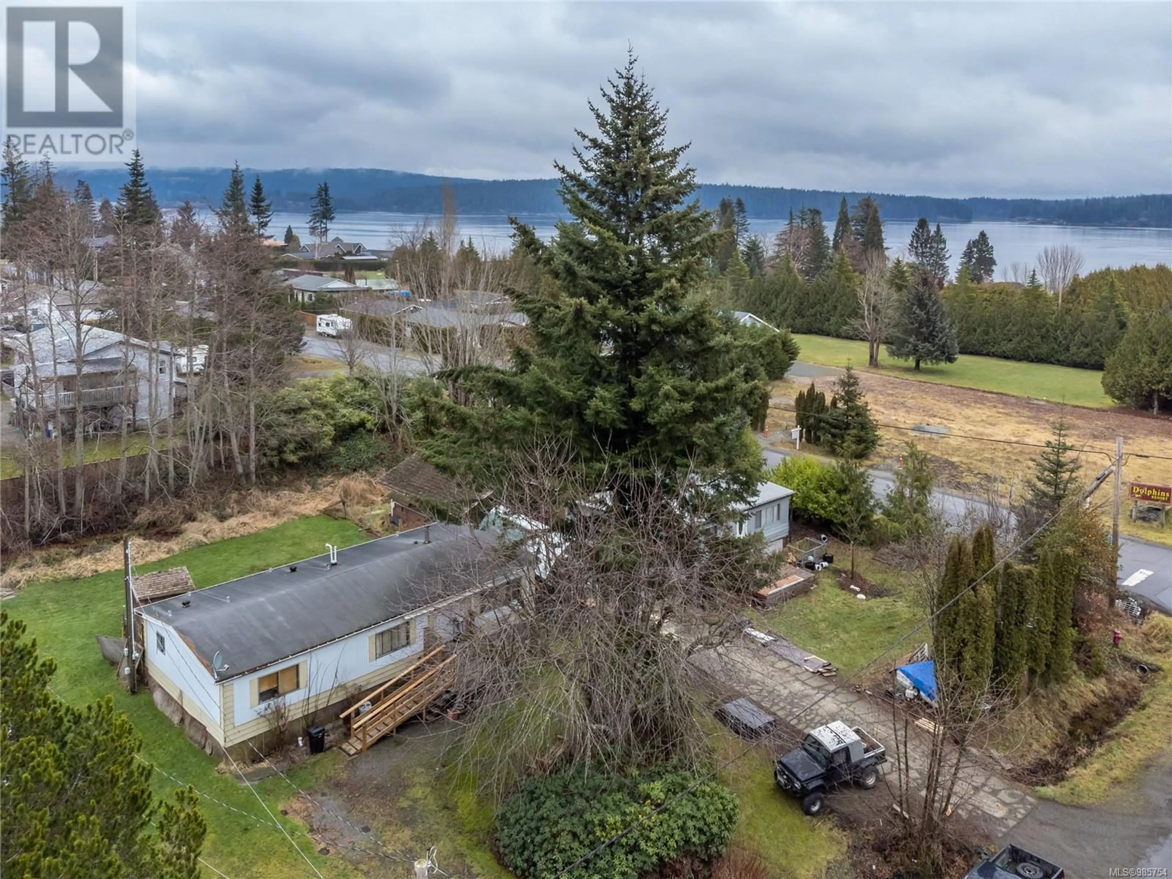 A pic from outside/outdoor area/front of a property/back of a property/a pic from drone, water/lake/river/ocean view for 1780 McDonald Rd, Campbell River British Columbia V9W5K1