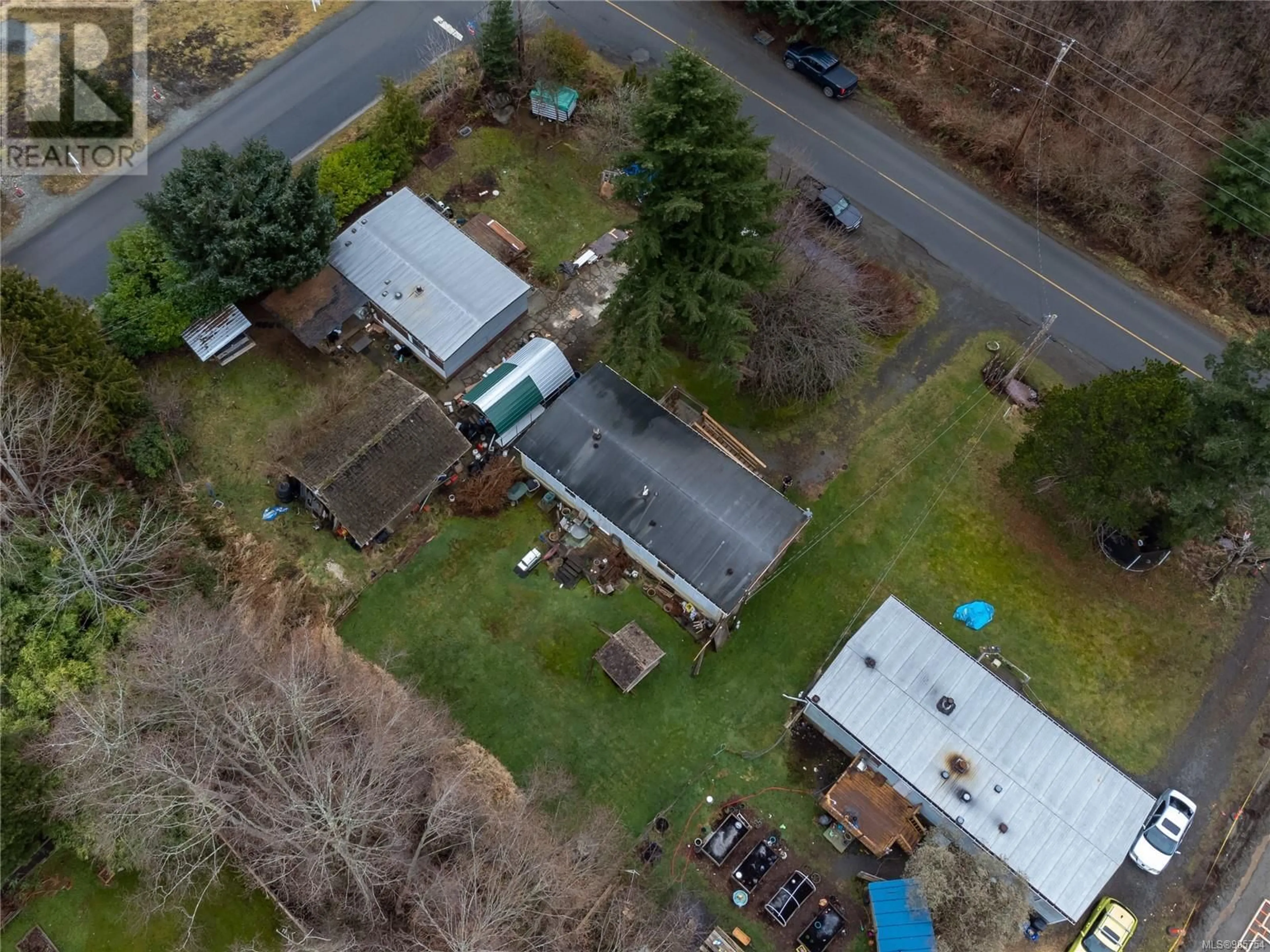 A pic from outside/outdoor area/front of a property/back of a property/a pic from drone, unknown for 1780 McDonald Rd, Campbell River British Columbia V9W5K1