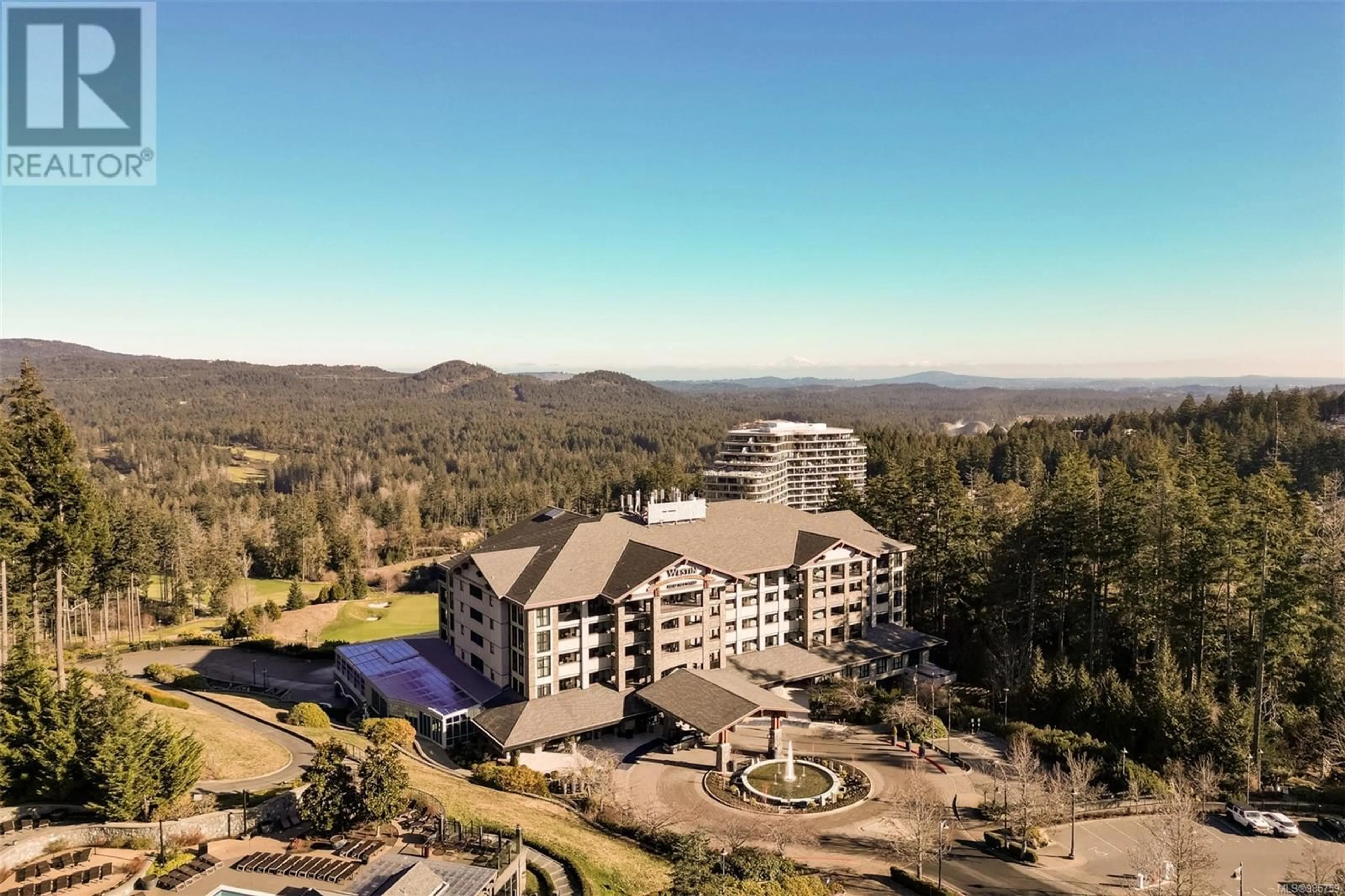 A pic from outside/outdoor area/front of a property/back of a property/a pic from drone, mountain view for 335/337 C 1999 Country Club Way, Langford British Columbia V9B6R3