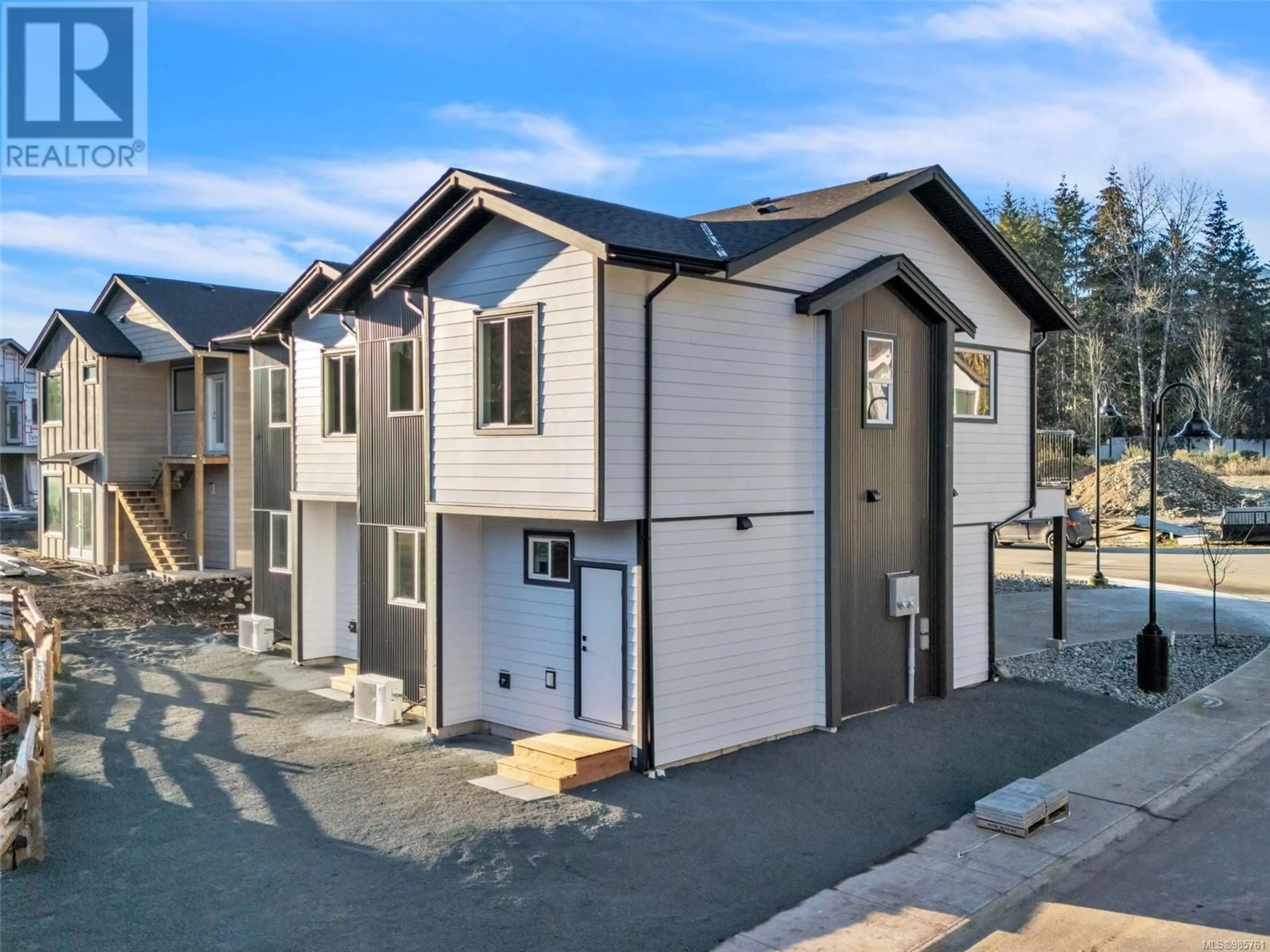 Home with vinyl exterior material, street for A 110 Plante Cres, Lake Cowichan British Columbia V0R2G0