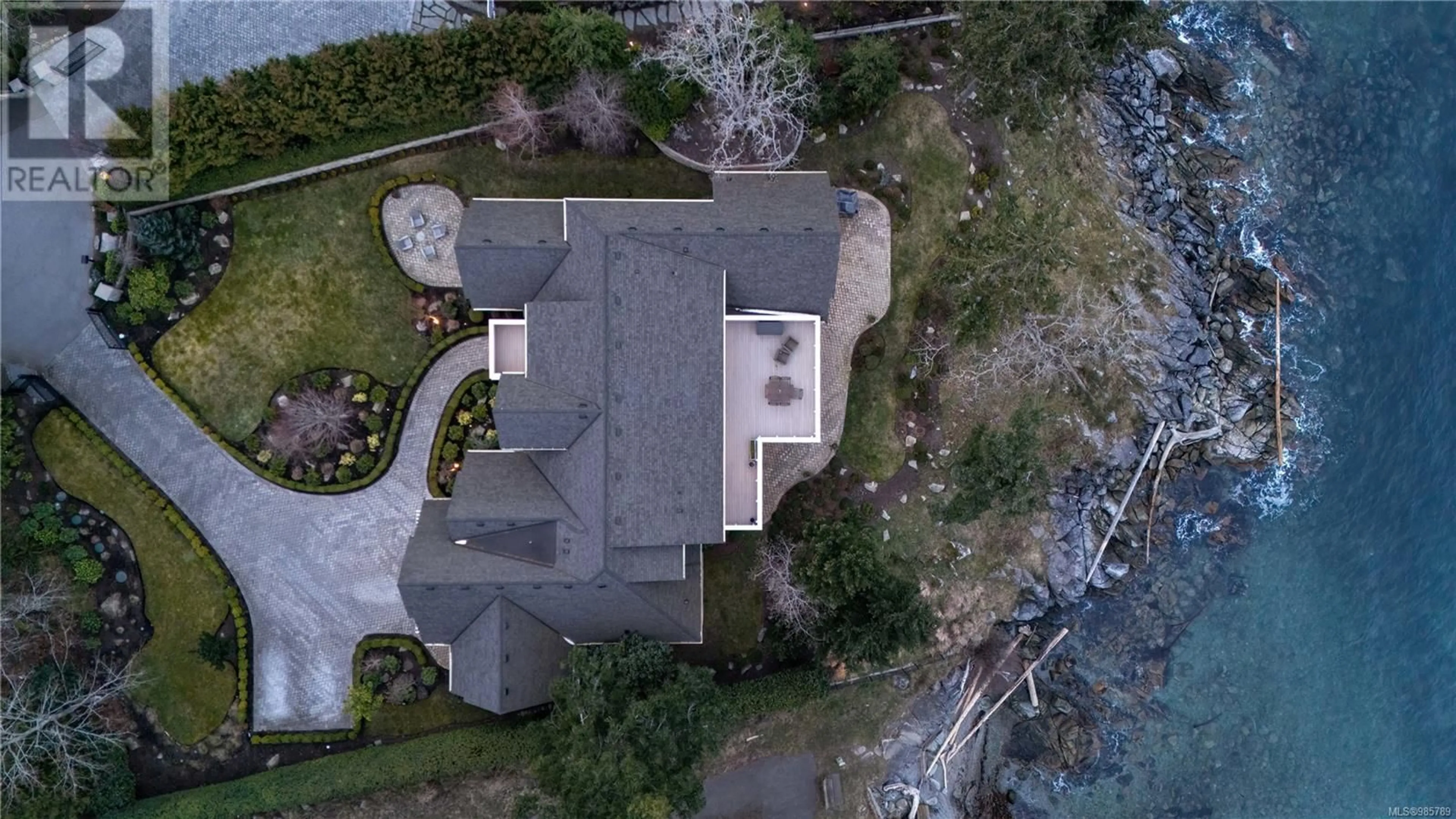 A pic from outside/outdoor area/front of a property/back of a property/a pic from drone, water/lake/river/ocean view for 2616 Queenswood Lane, Saanich British Columbia V8N1X5