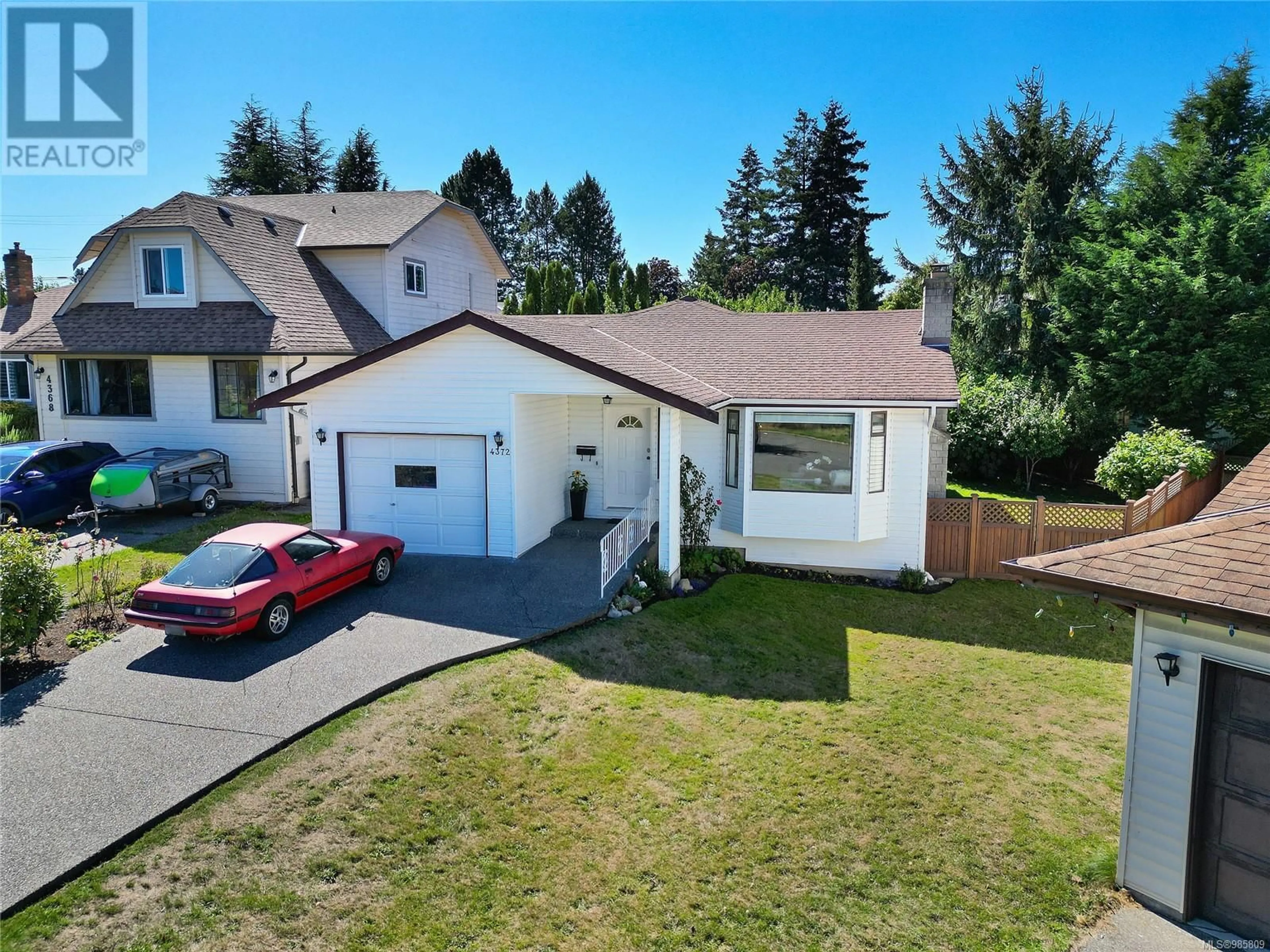 A pic from outside/outdoor area/front of a property/back of a property/a pic from drone, street for 4372 Vanguard Pl, Saanich British Columbia V8Z6X3