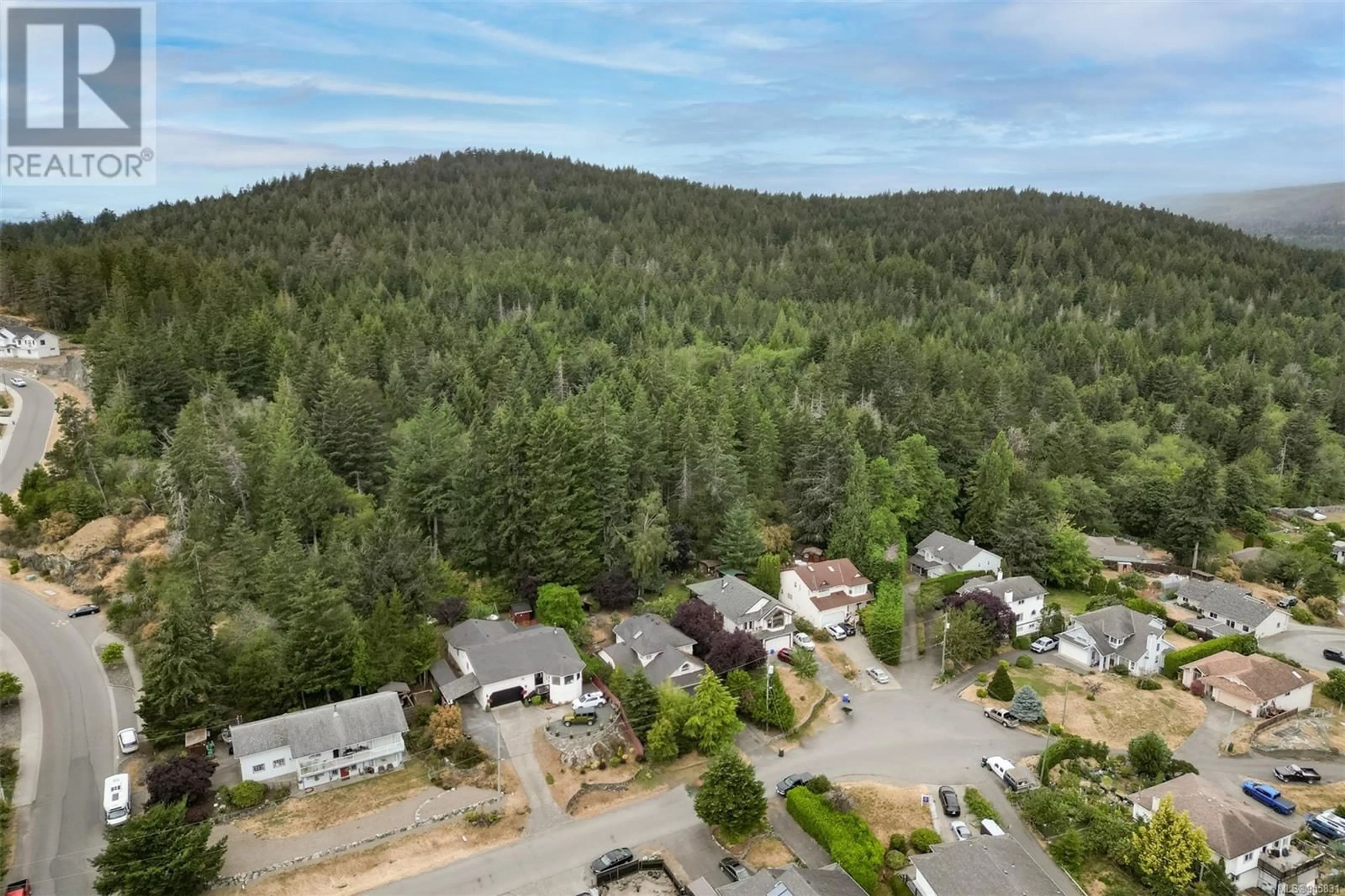 A pic from outside/outdoor area/front of a property/back of a property/a pic from drone, forest/trees view for 2438 Valleyview Pl, Sooke British Columbia V9Z0L4