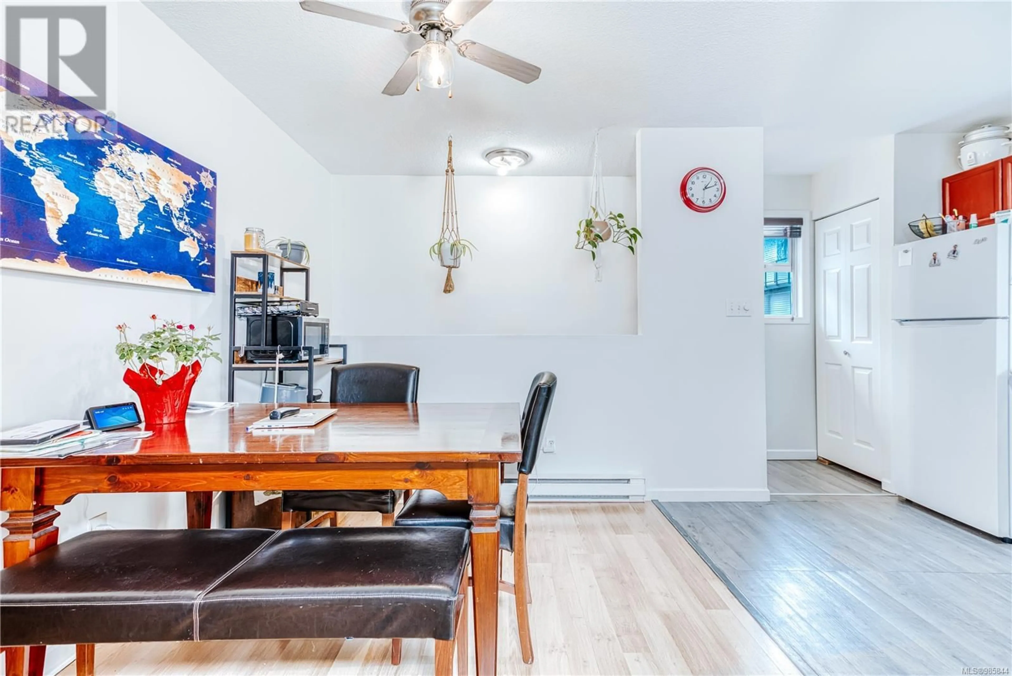 Dining room, wood/laminate floor for 2 4801 Hammond Bay Rd, Nanaimo British Columbia V9T5A9