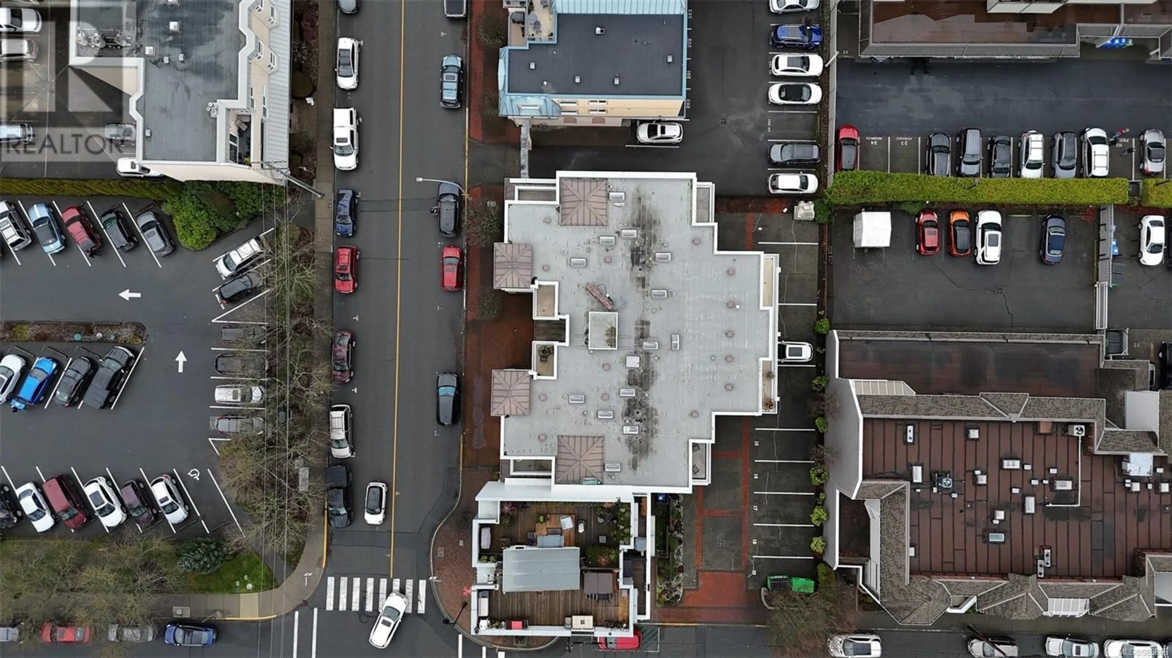 A pic from outside/outdoor area/front of a property/back of a property/a pic from drone, city buildings view from balcony for 204 2475 Bevan Ave, Sidney British Columbia V8L1W2