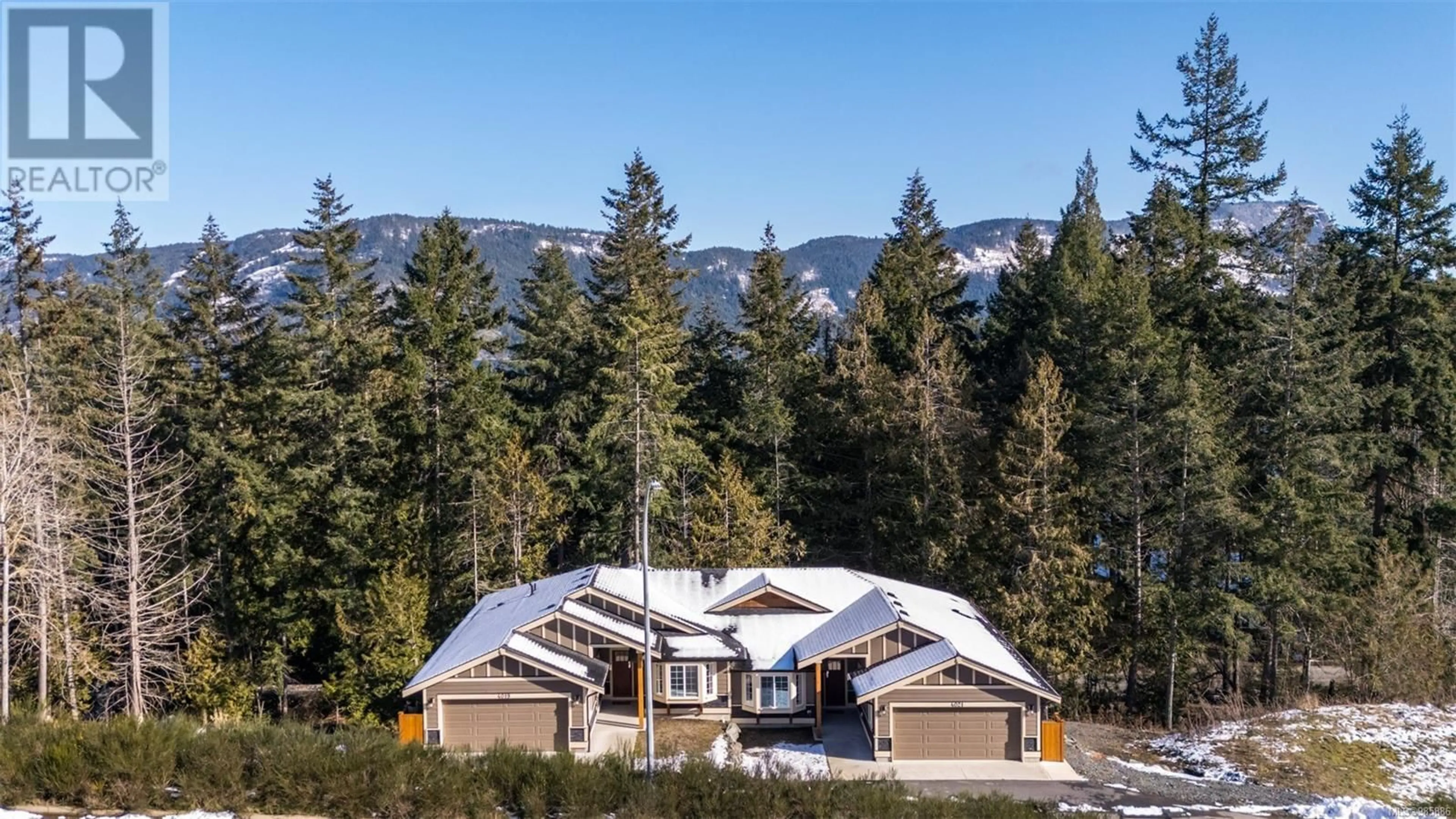 A pic from outside/outdoor area/front of a property/back of a property/a pic from drone, mountain view for 4019 Otters Close, Duncan British Columbia V9L5Y3