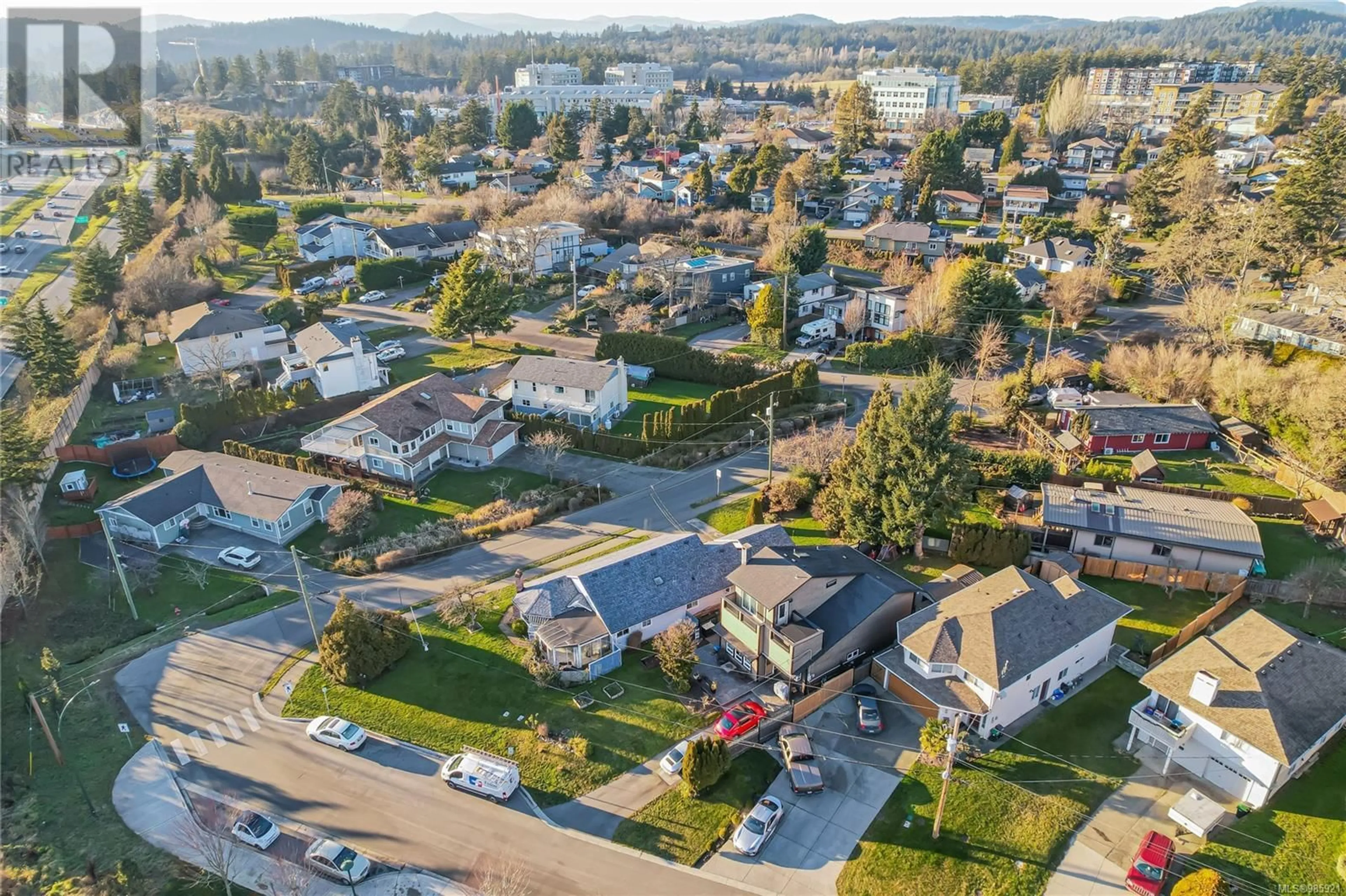 A pic from outside/outdoor area/front of a property/back of a property/a pic from drone, street for 77 St. Giles St, View Royal British Columbia V8Z5E2