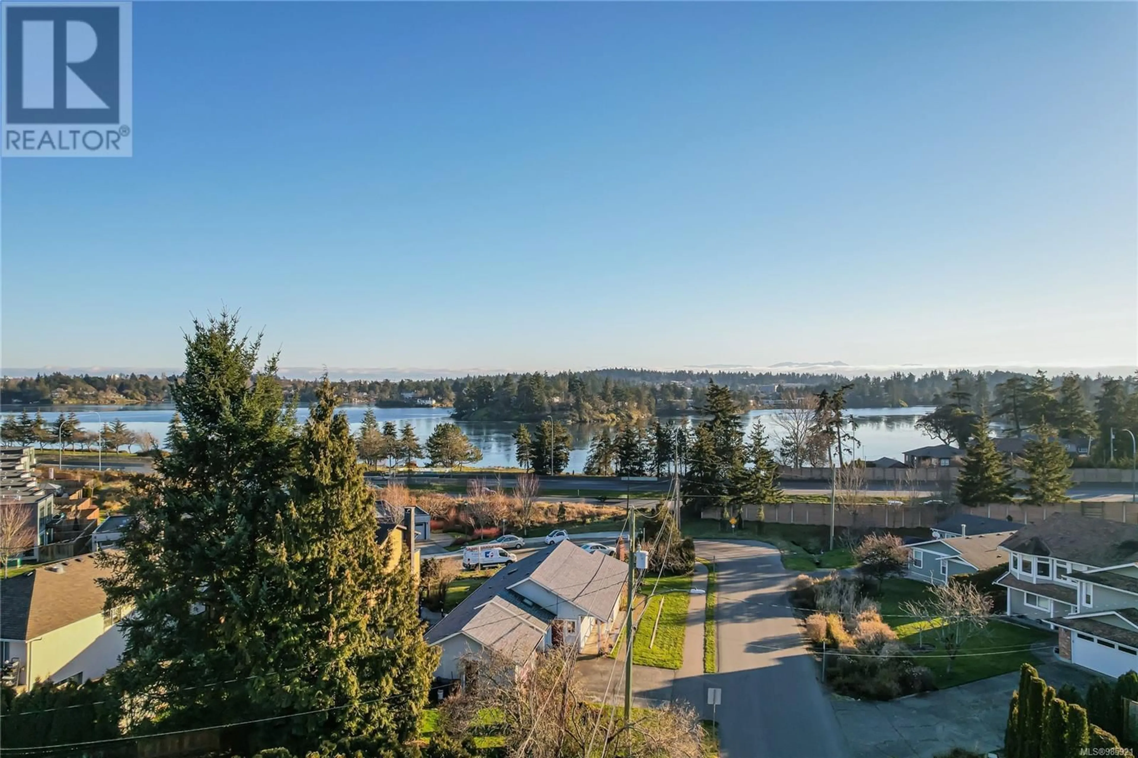 A pic from outside/outdoor area/front of a property/back of a property/a pic from drone, water/lake/river/ocean view for 77 St. Giles St, View Royal British Columbia V8Z5E2