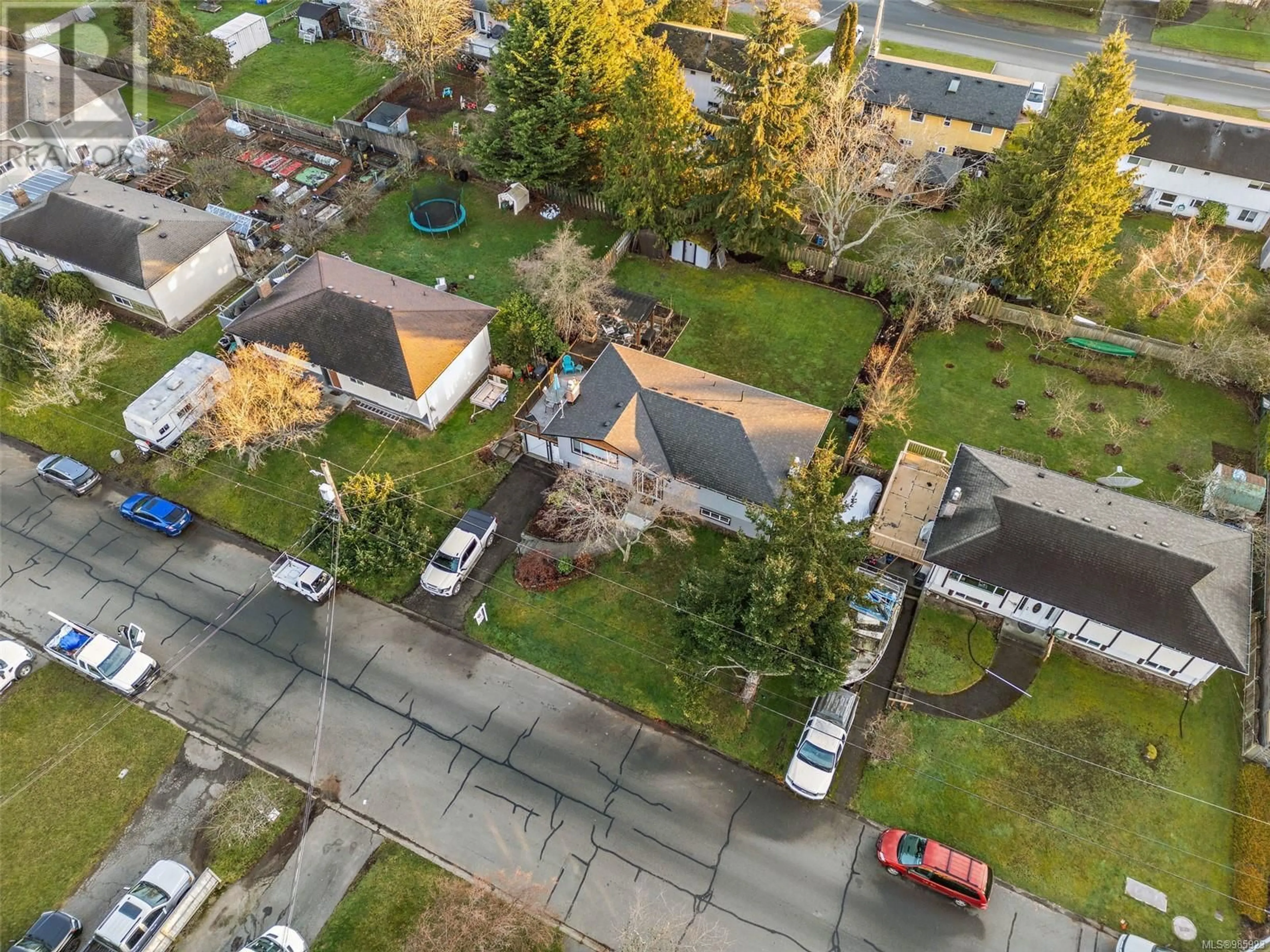 A pic from outside/outdoor area/front of a property/back of a property/a pic from drone, street for 2036 Melville Dr, Sidney British Columbia V8L2N1