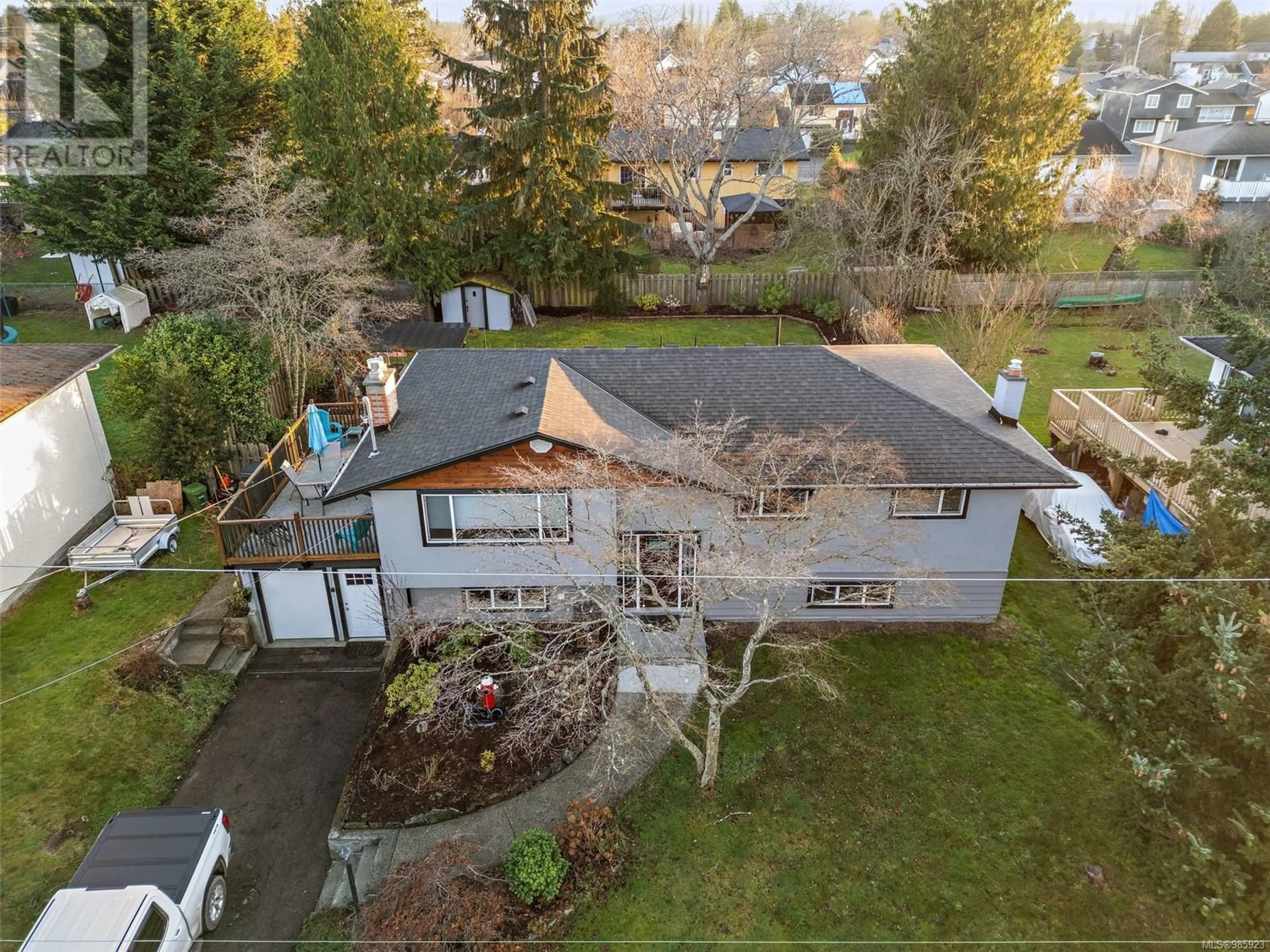 A pic from outside/outdoor area/front of a property/back of a property/a pic from drone, street for 2036 Melville Dr, Sidney British Columbia V8L2N1