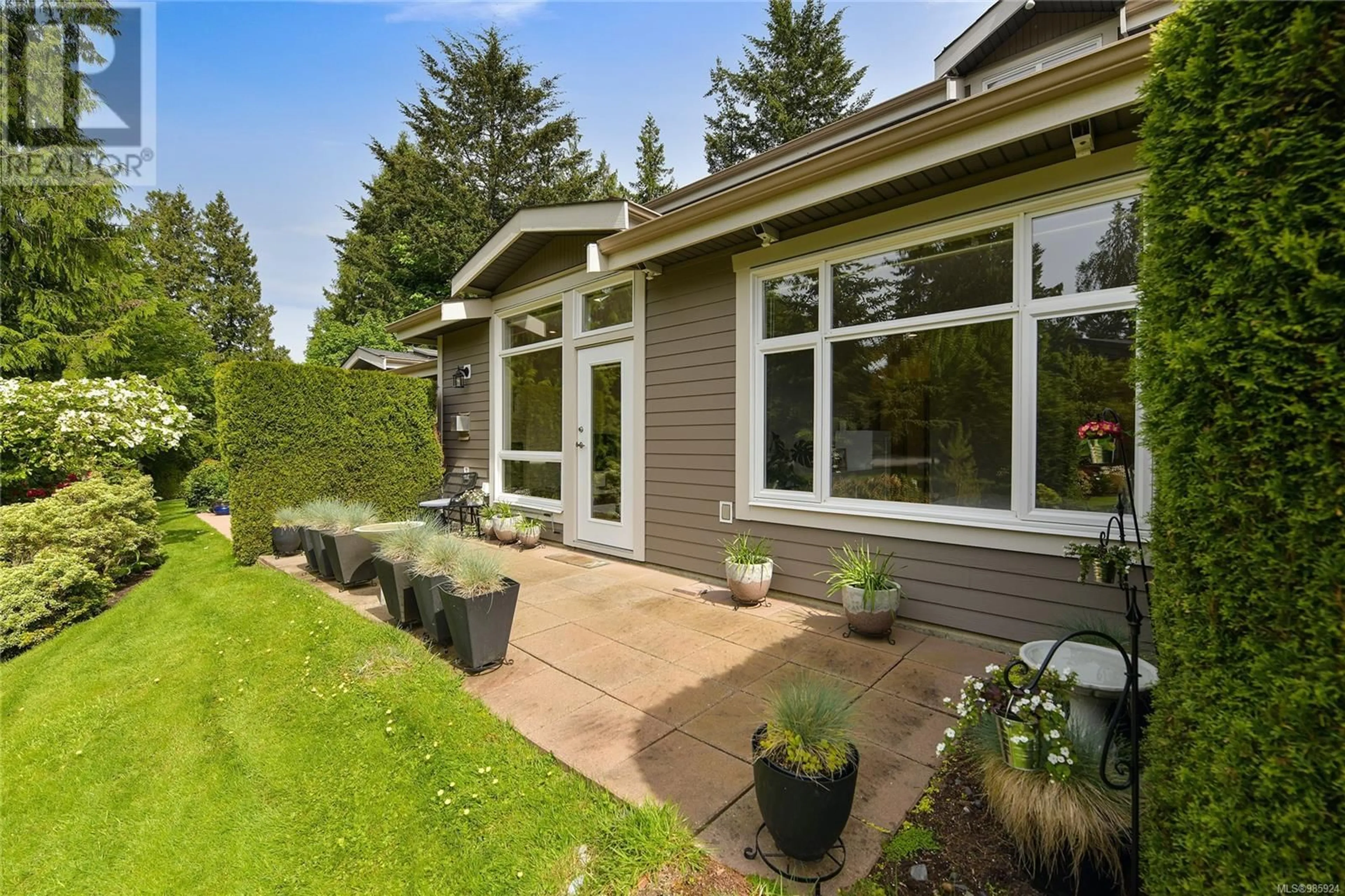 Home with vinyl exterior material, street for 12 974 Sutcliffe Rd, Saanich British Columbia V8Y1M8