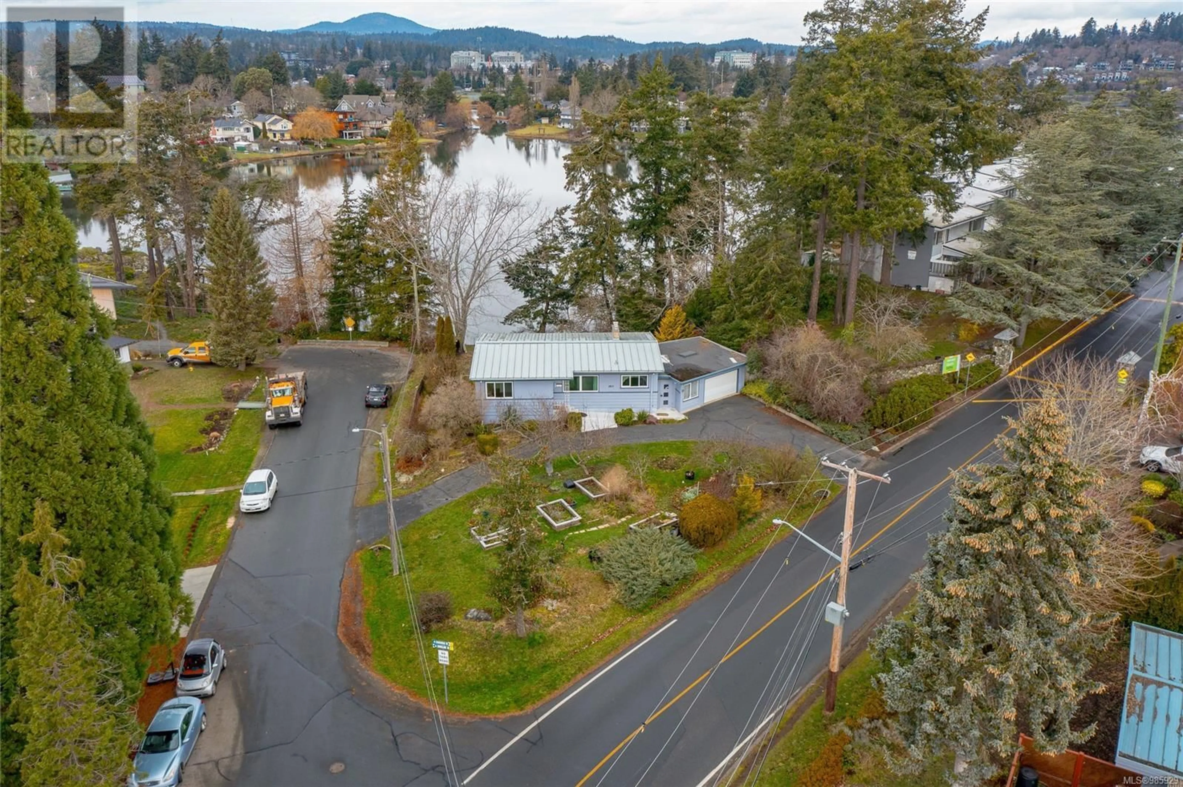 A pic from outside/outdoor area/front of a property/back of a property/a pic from drone, water/lake/river/ocean view for 2815 Shoreline Dr, View Royal British Columbia V9B1M7