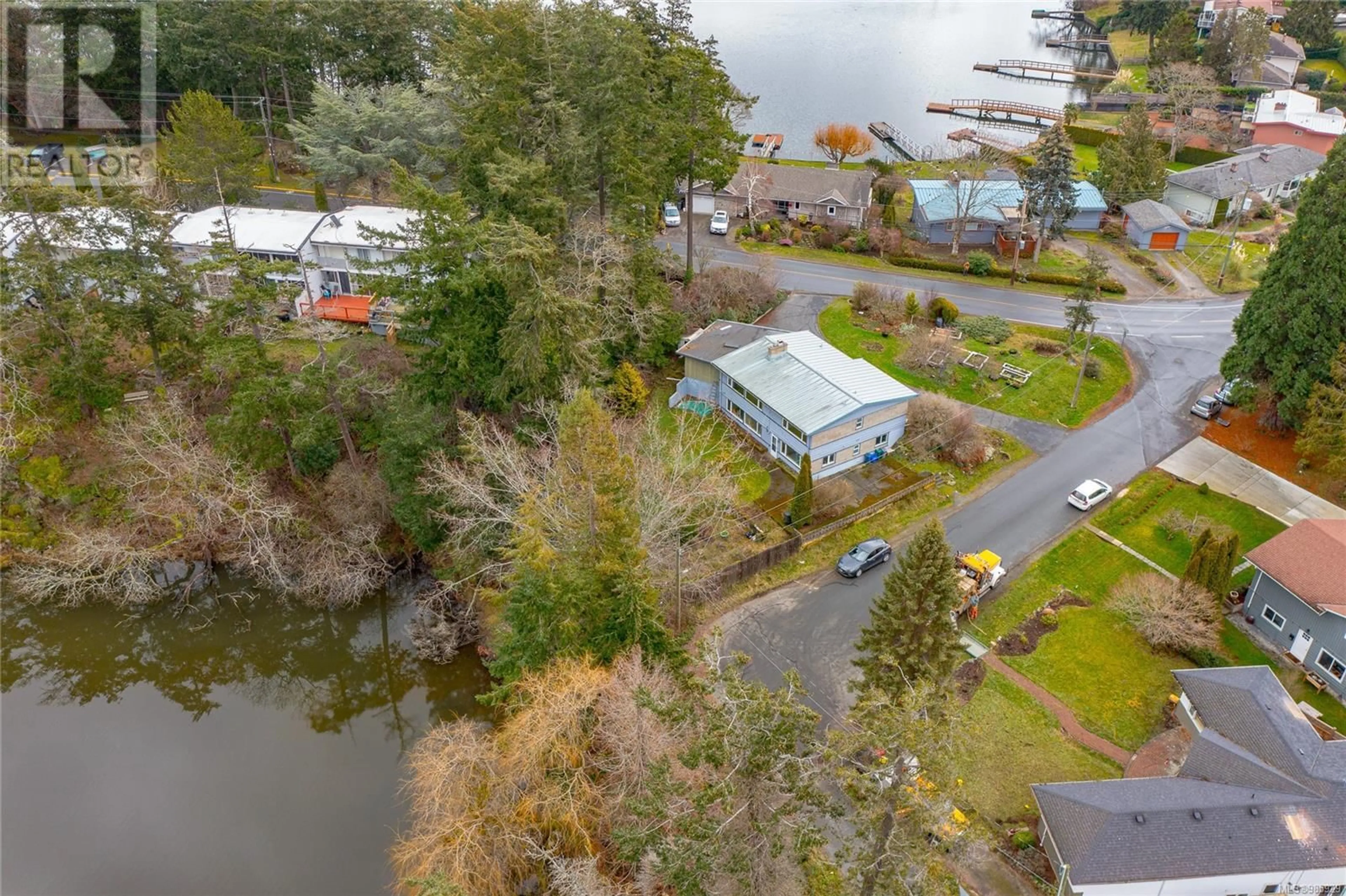 A pic from outside/outdoor area/front of a property/back of a property/a pic from drone, water/lake/river/ocean view for 2815 Shoreline Dr, View Royal British Columbia V9B1M7