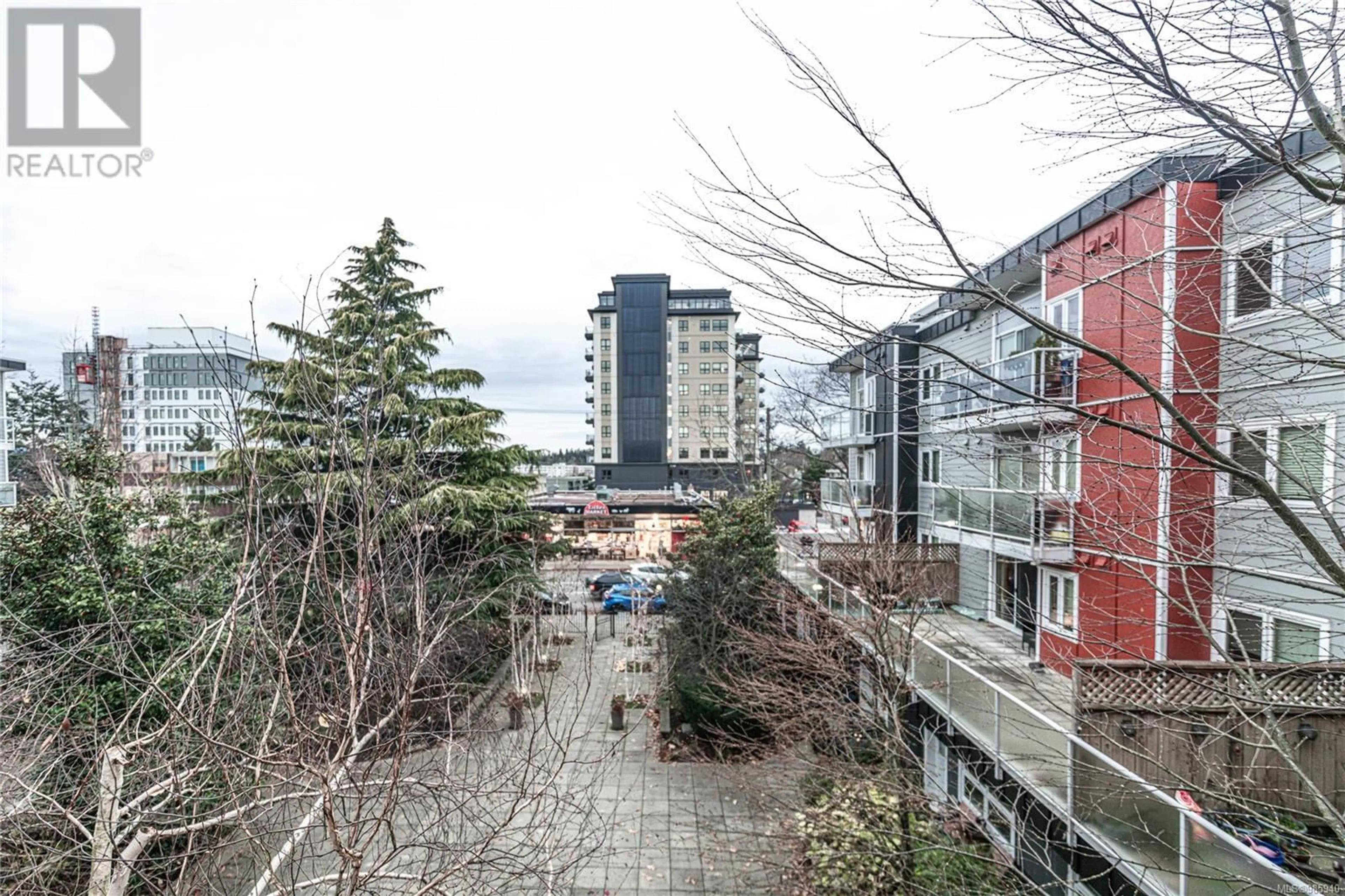 Patio, city buildings view from balcony for 310 1315 Esquimalt Rd, Esquimalt British Columbia V9A3P5