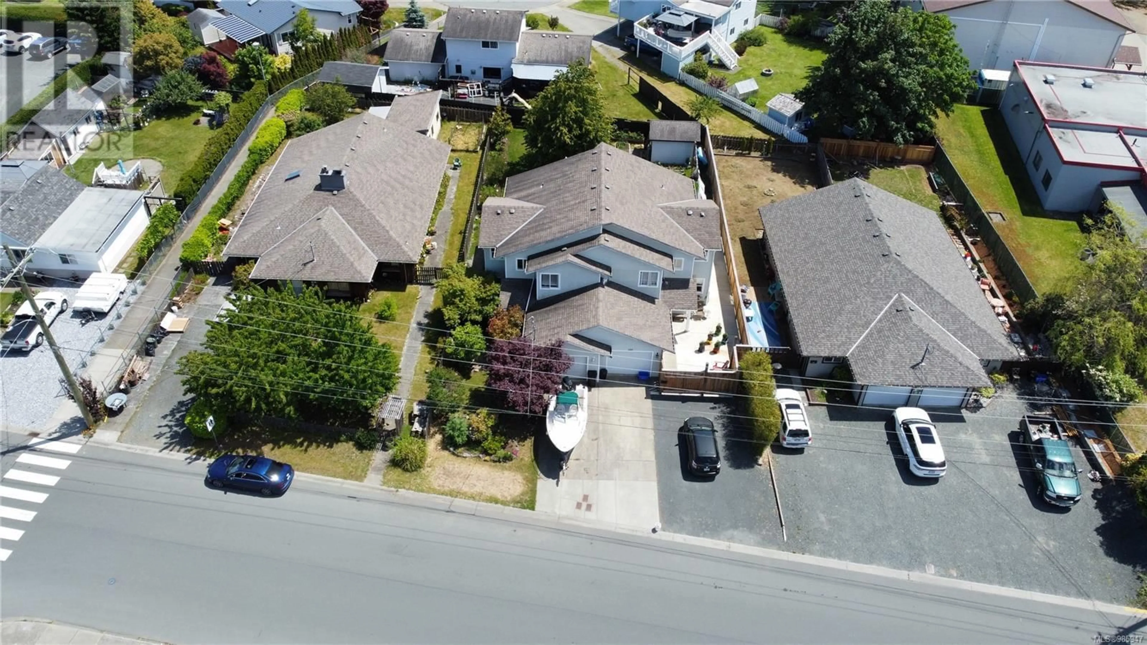 A pic from outside/outdoor area/front of a property/back of a property/a pic from drone, street for 223 Larwood Rd, Campbell River British Columbia V9W1S3