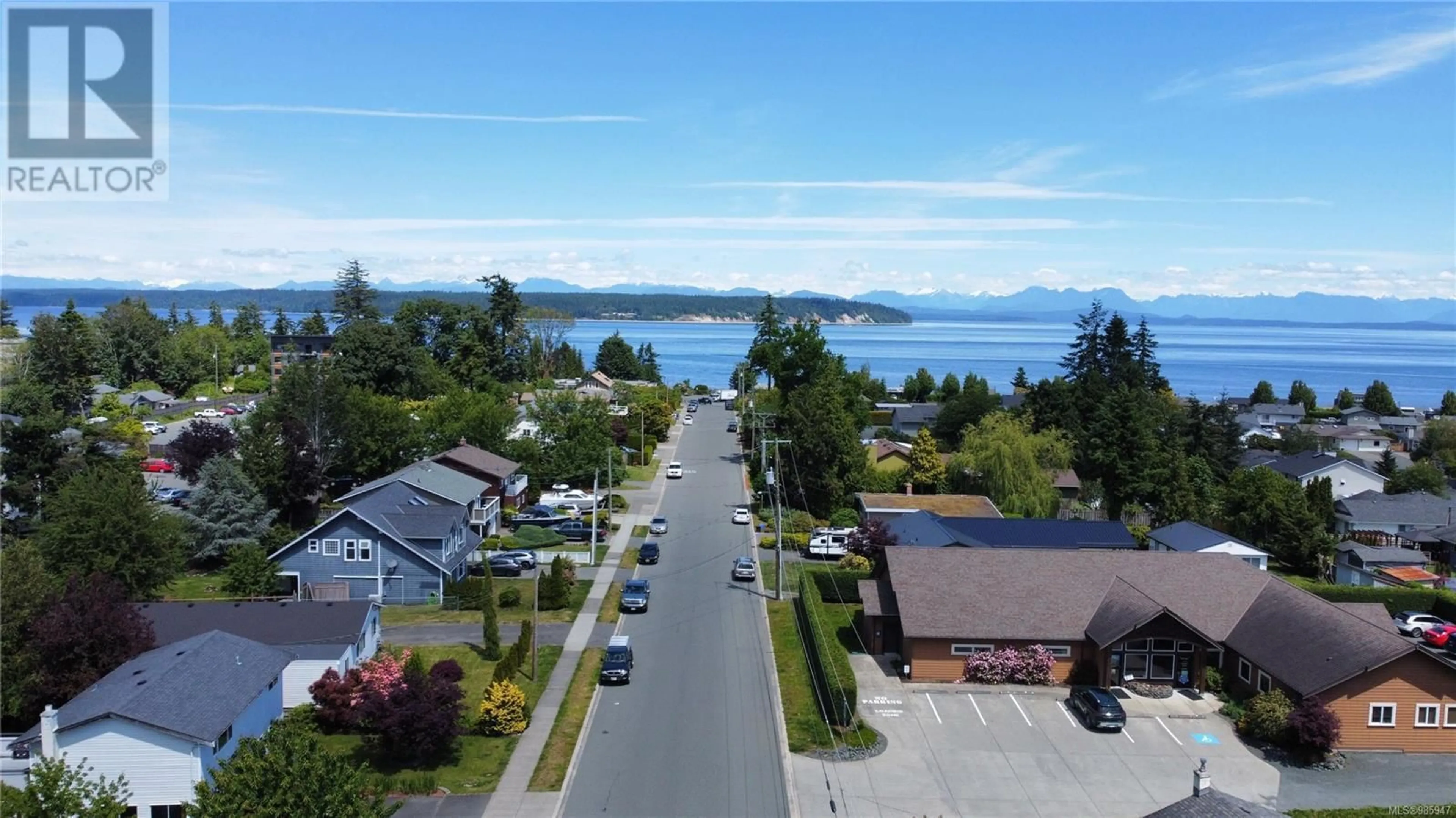 A pic from outside/outdoor area/front of a property/back of a property/a pic from drone, water/lake/river/ocean view for 223 Larwood Rd, Campbell River British Columbia V9W1S3