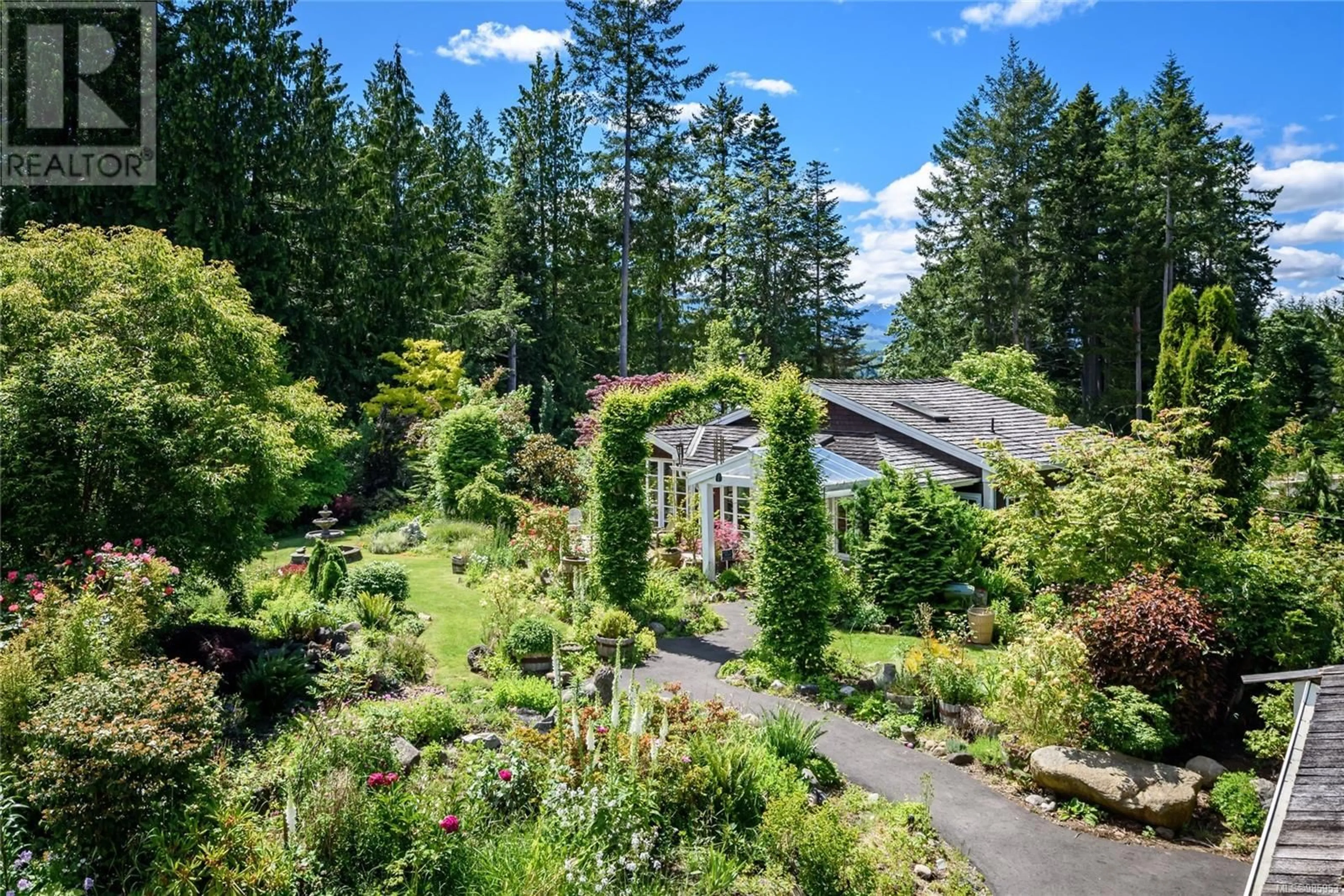 A pic from outside/outdoor area/front of a property/back of a property/a pic from drone, unknown for 7679 VICTOR LANE, Fanny Bay British Columbia V0R1W0