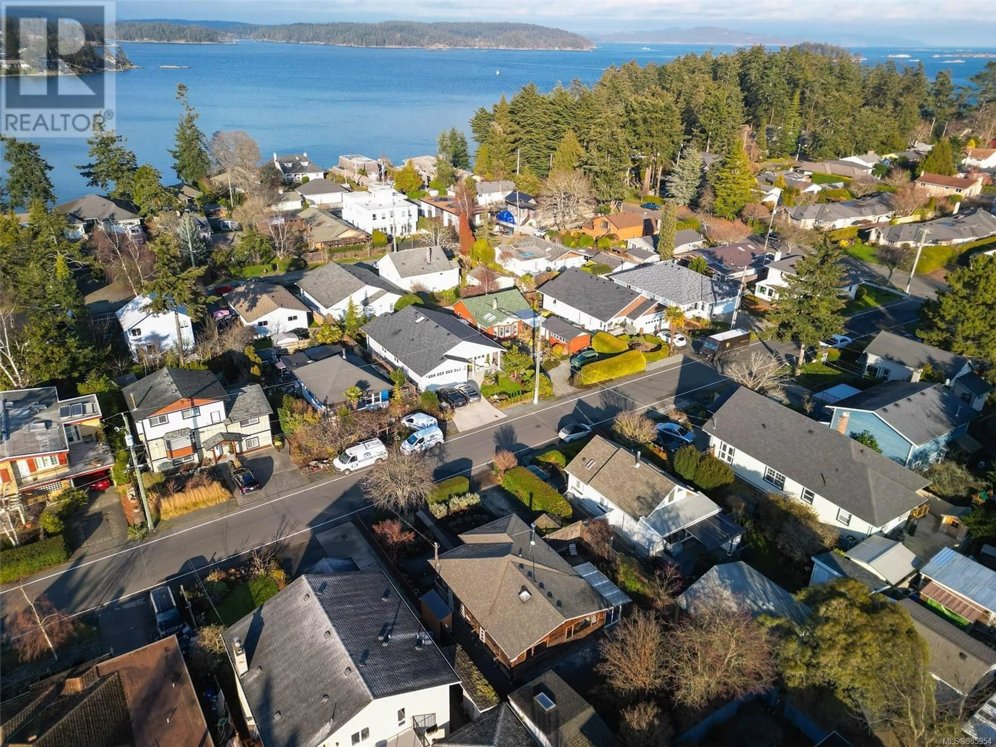 A pic from outside/outdoor area/front of a property/back of a property/a pic from drone, water/lake/river/ocean view for 2429 Amelia Ave, Sidney British Columbia V8L2J4