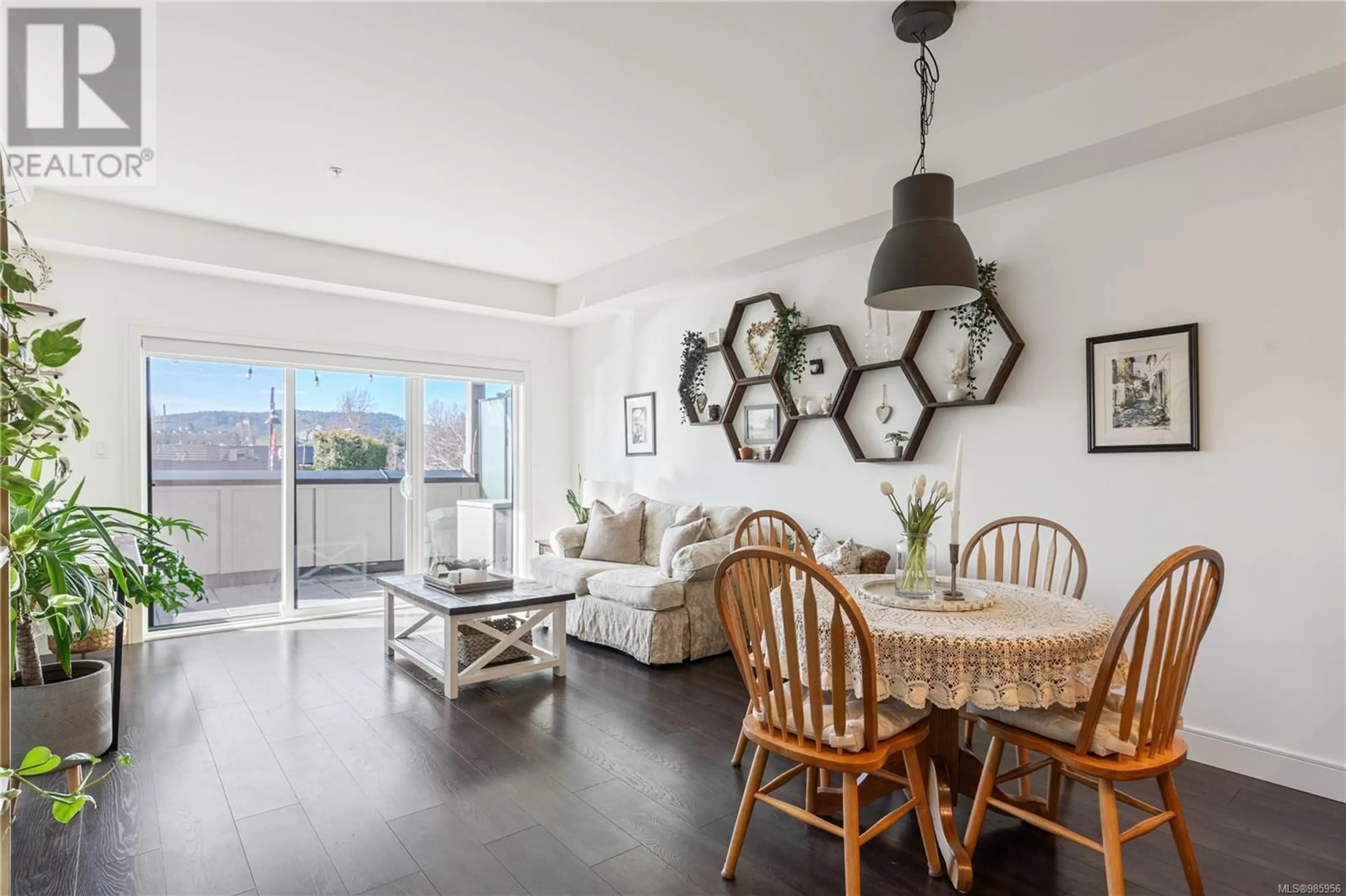 Living room with furniture, unknown for 207 7111 West Saanich Rd, Central Saanich British Columbia V8M1P7