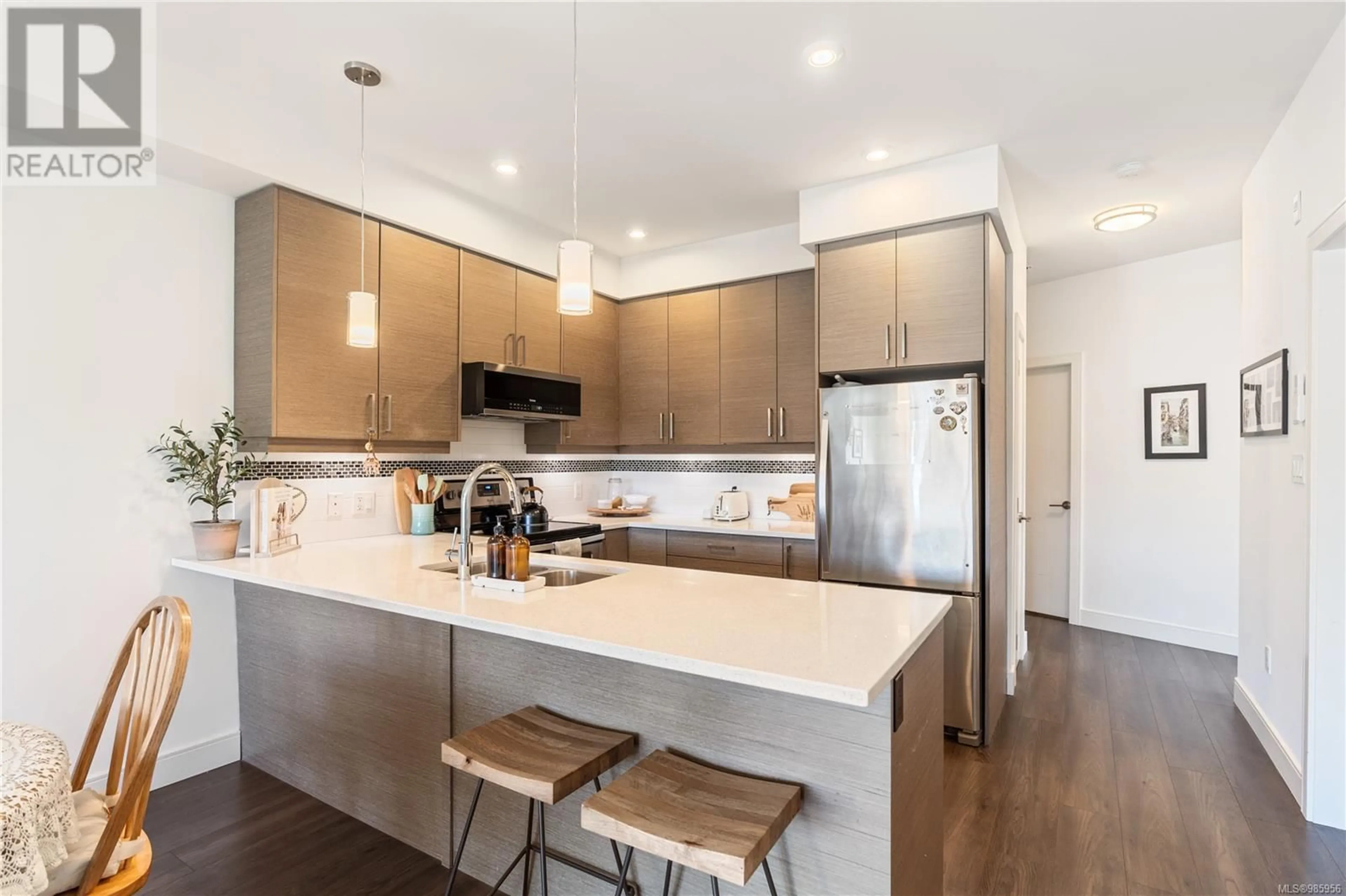 Open concept kitchen, unknown for 207 7111 West Saanich Rd, Central Saanich British Columbia V8M1P7