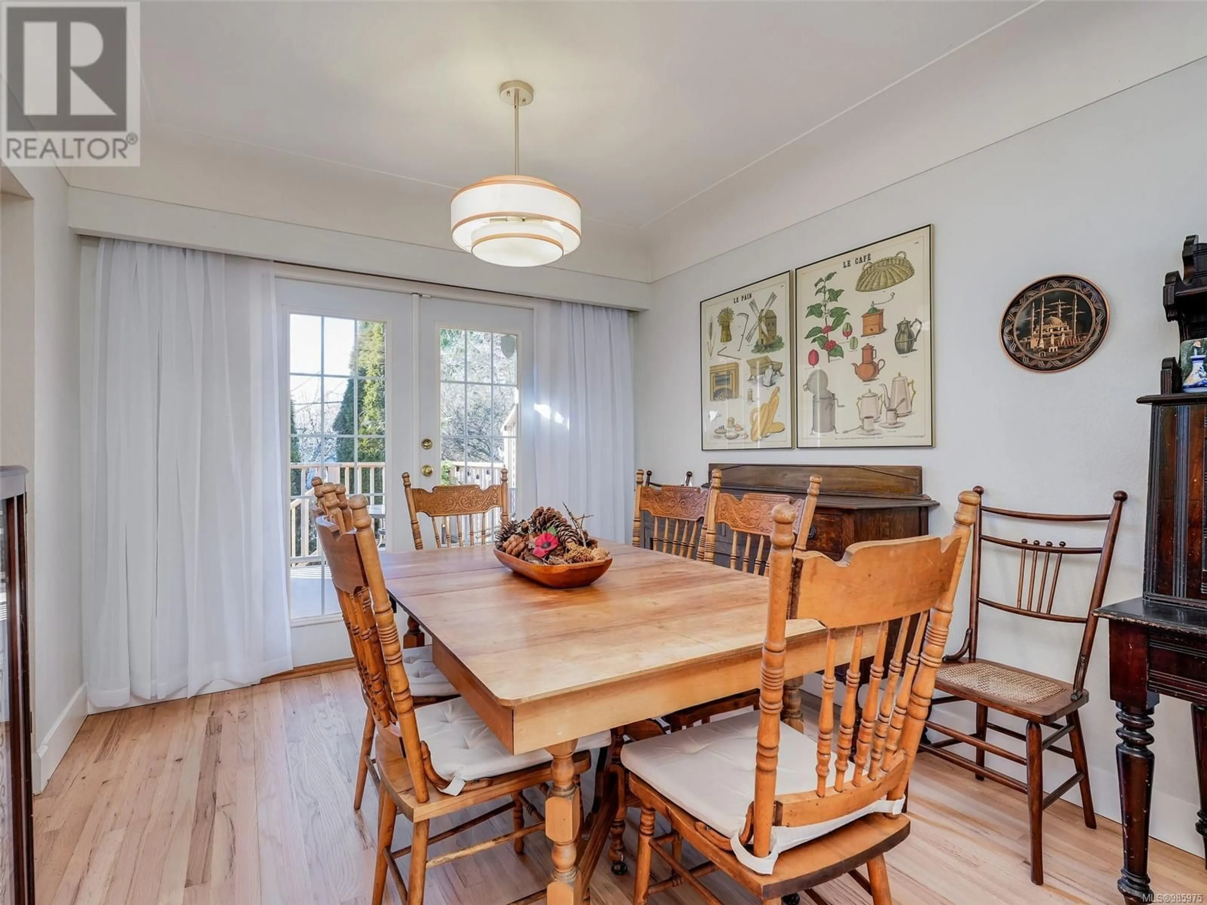 Dining room, wood/laminate floor for 2898 Ilene Terr, Saanich British Columbia V8R4P1