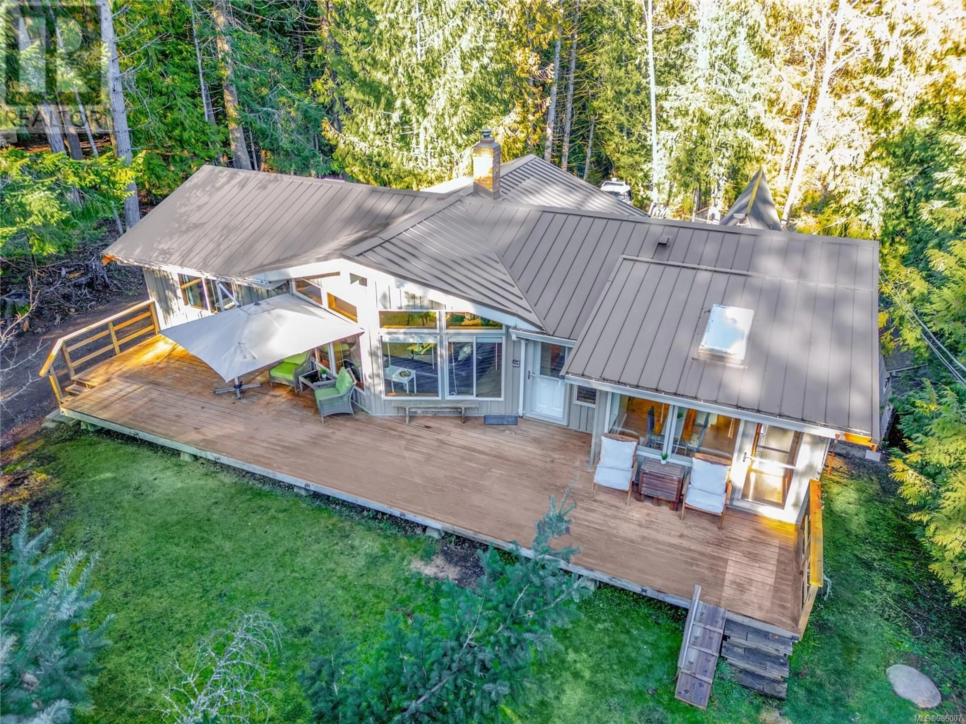 A pic from outside/outdoor area/front of a property/back of a property/a pic from drone, forest/trees view for 3722 Bosun Way, Pender Island British Columbia V0N2M2