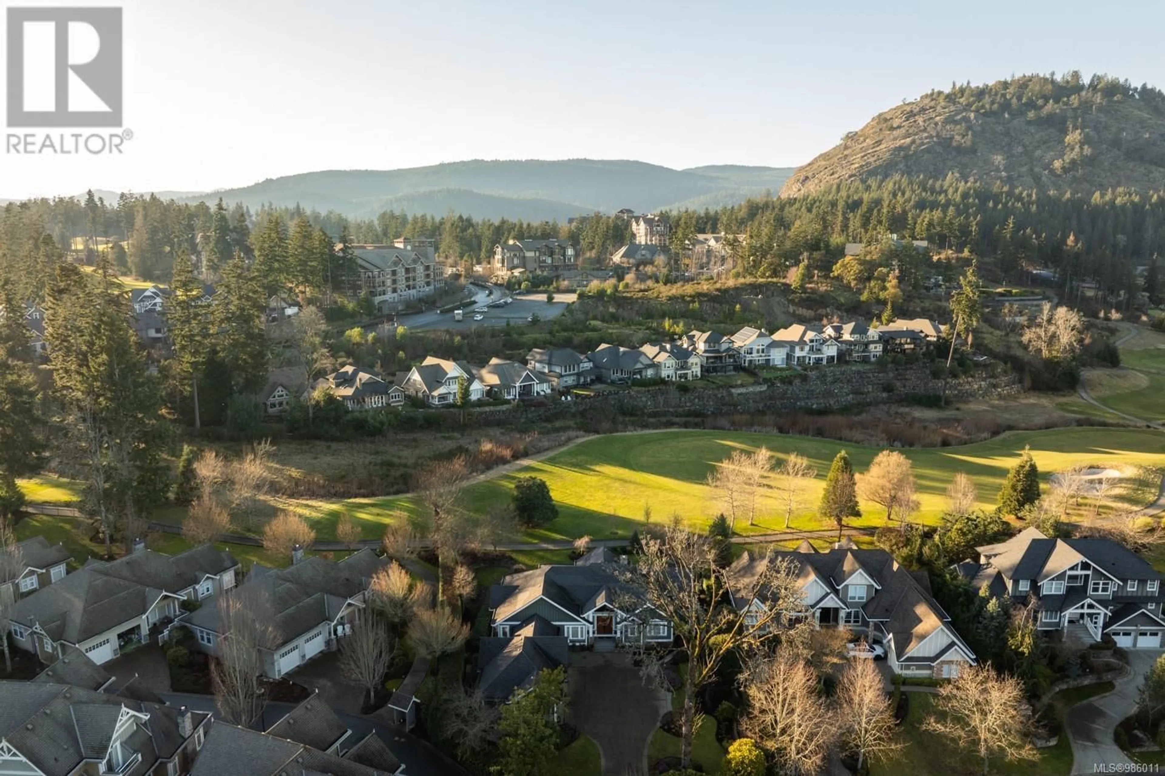 A pic from outside/outdoor area/front of a property/back of a property/a pic from drone, mountain view for 2056 Troon Crt, Langford British Columbia V9B6R6