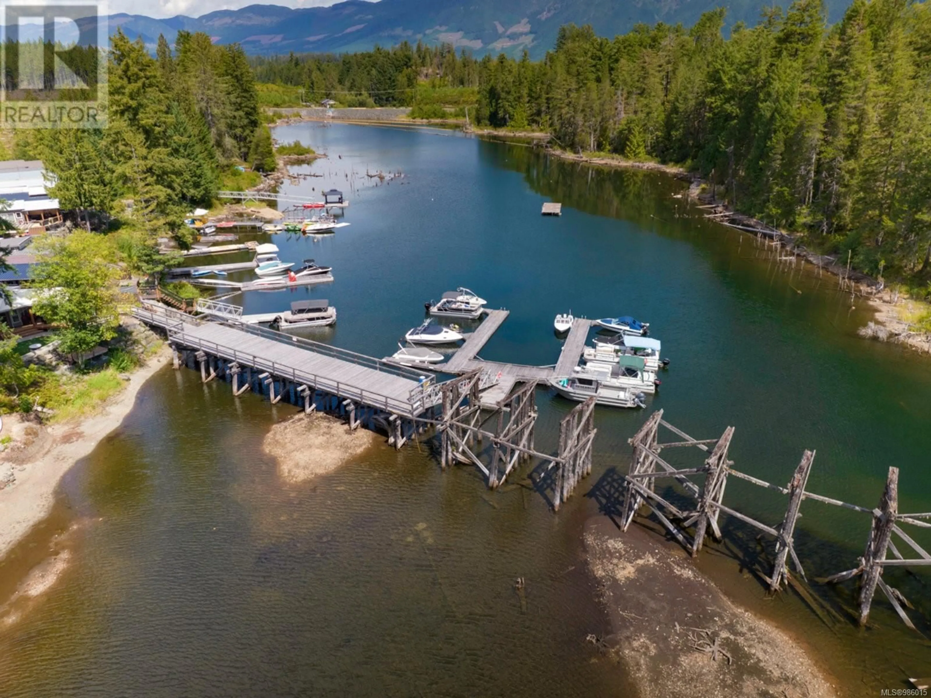 A pic from outside/outdoor area/front of a property/back of a property/a pic from drone, water/lake/river/ocean view for 38 - 10750 CENTRAL LAKE ROAD, Port Alberni British Columbia V9Y8Z2