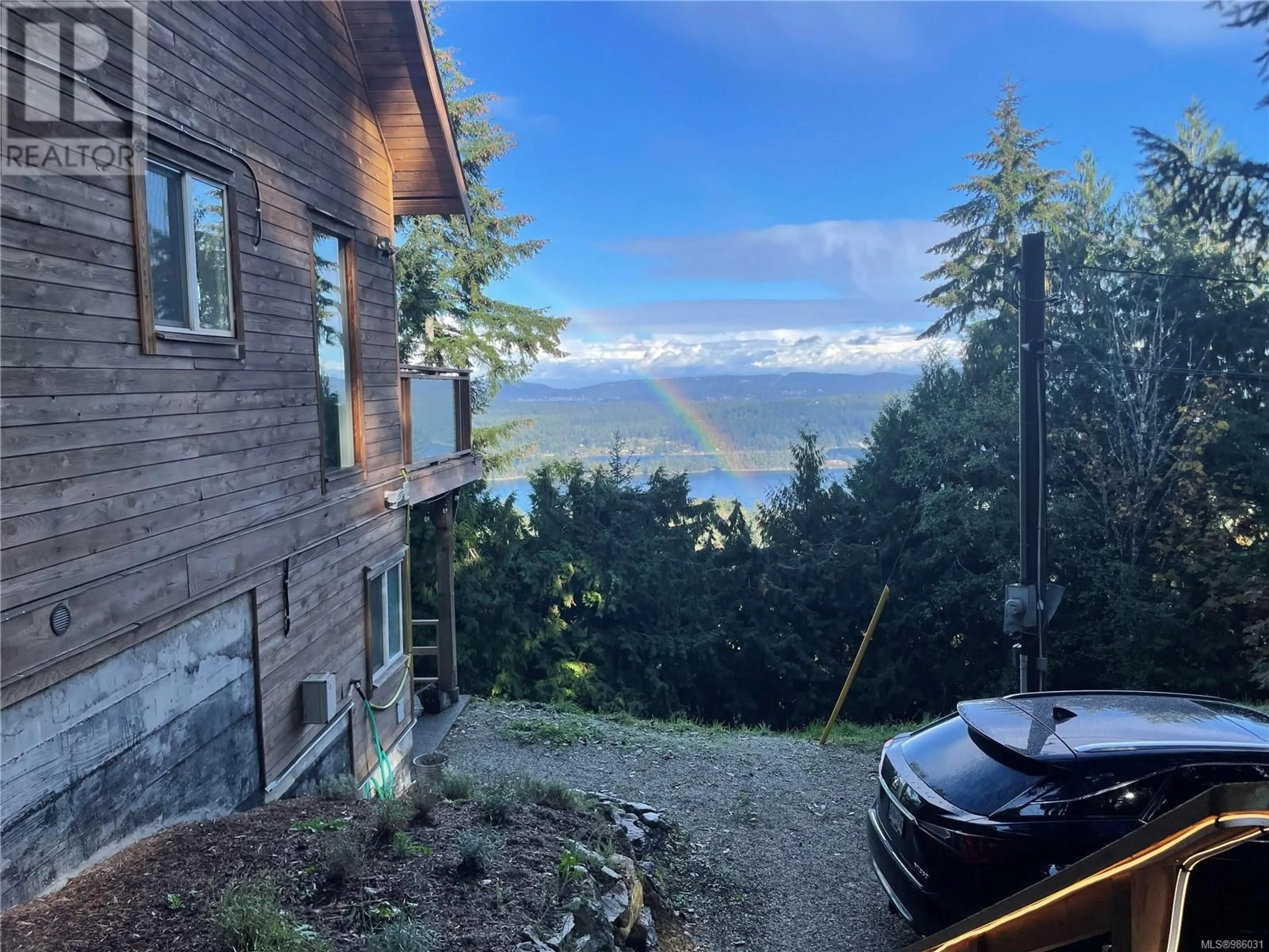 A pic from outside/outdoor area/front of a property/back of a property/a pic from drone, water/lake/river/ocean view for 181 Donore Rd, Salt Spring British Columbia V8K2H4