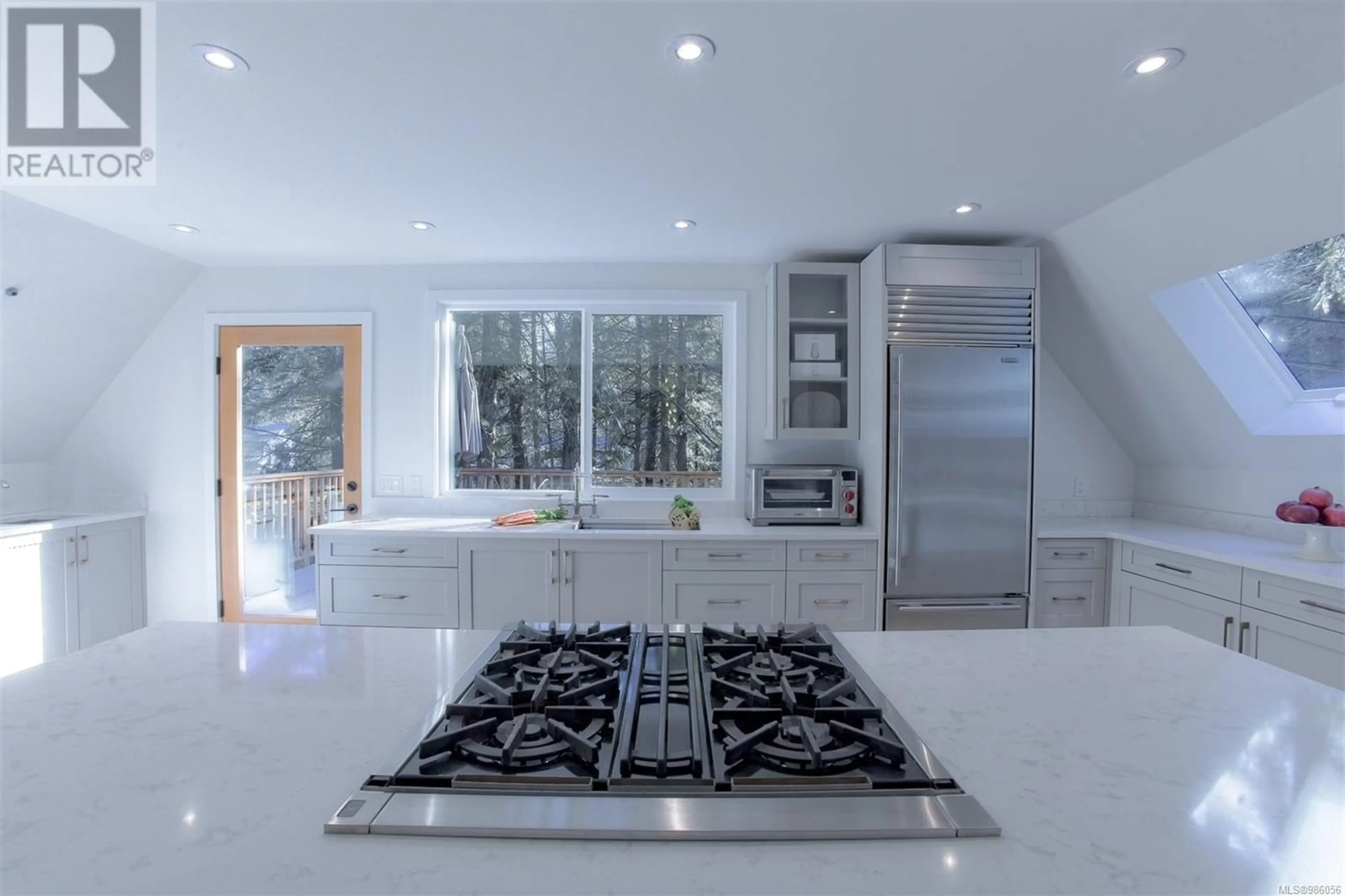 Contemporary kitchen, ceramic/tile floor for 141 Cedar Lane, Salt Spring British Columbia V8K1R1