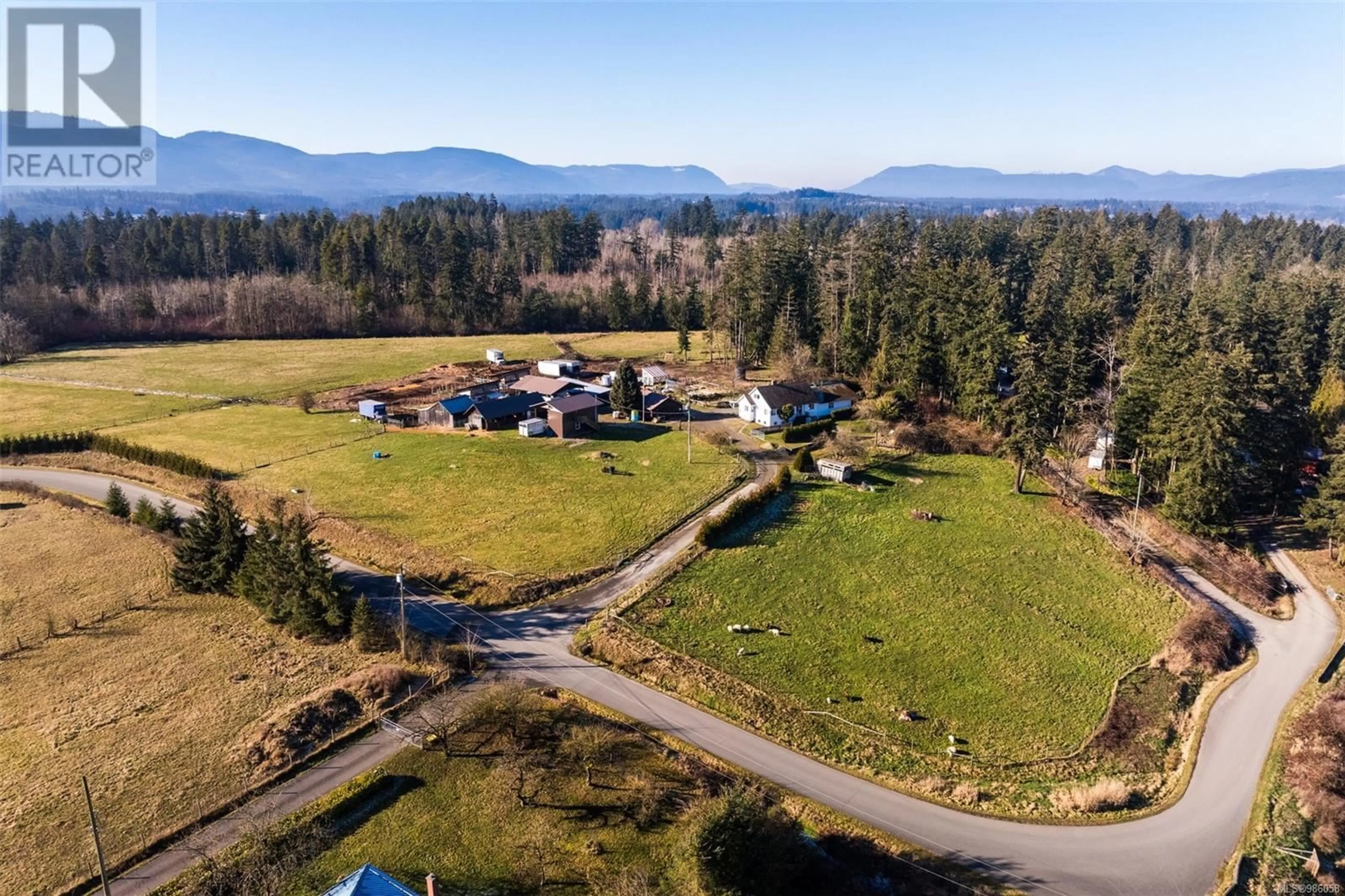 A pic from outside/outdoor area/front of a property/back of a property/a pic from drone, mountain view for 2484 Staghorn Rd, Duncan British Columbia V9L6L7