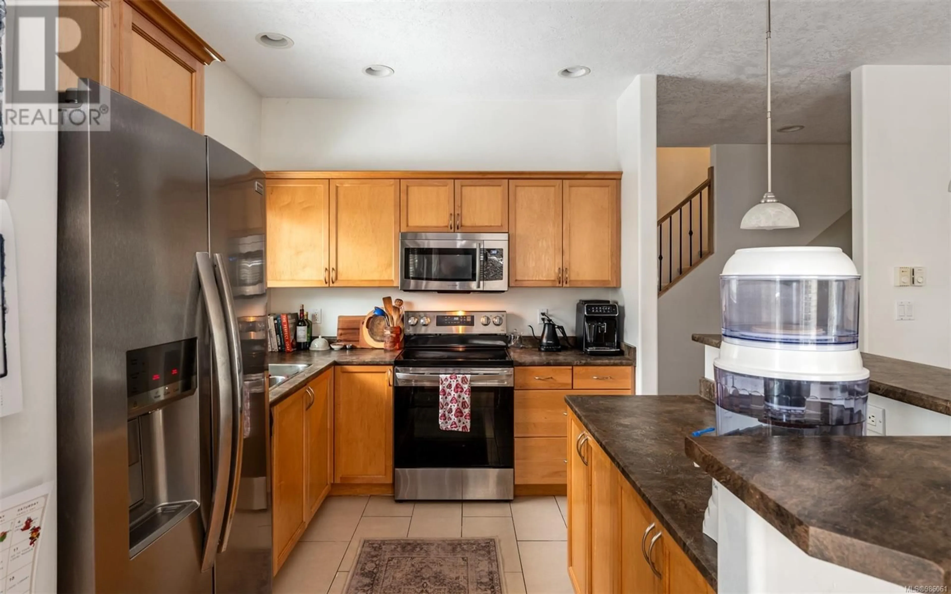 Standard kitchen, ceramic/tile floor for 1 1405 Mallek Cres, Victoria British Columbia V8T0A3