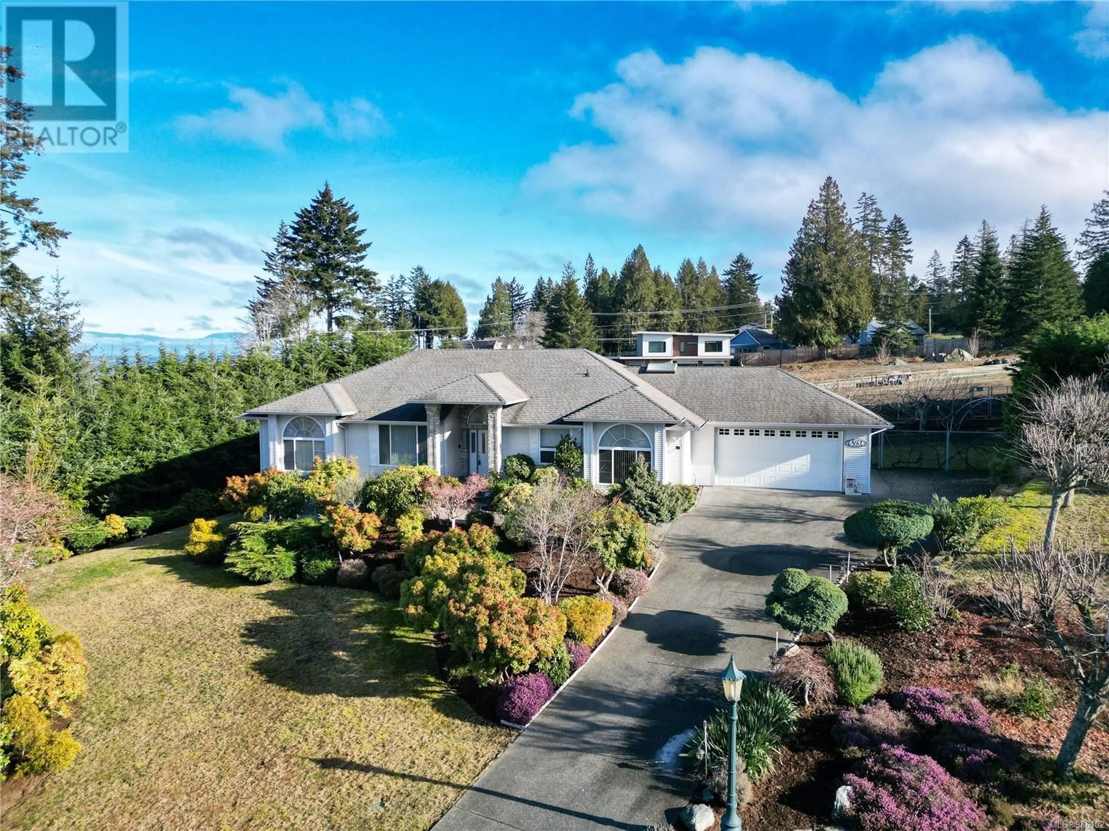 A pic from outside/outdoor area/front of a property/back of a property/a pic from drone, unknown for 6954 Seaside Terr, Lantzville British Columbia V0R2H0