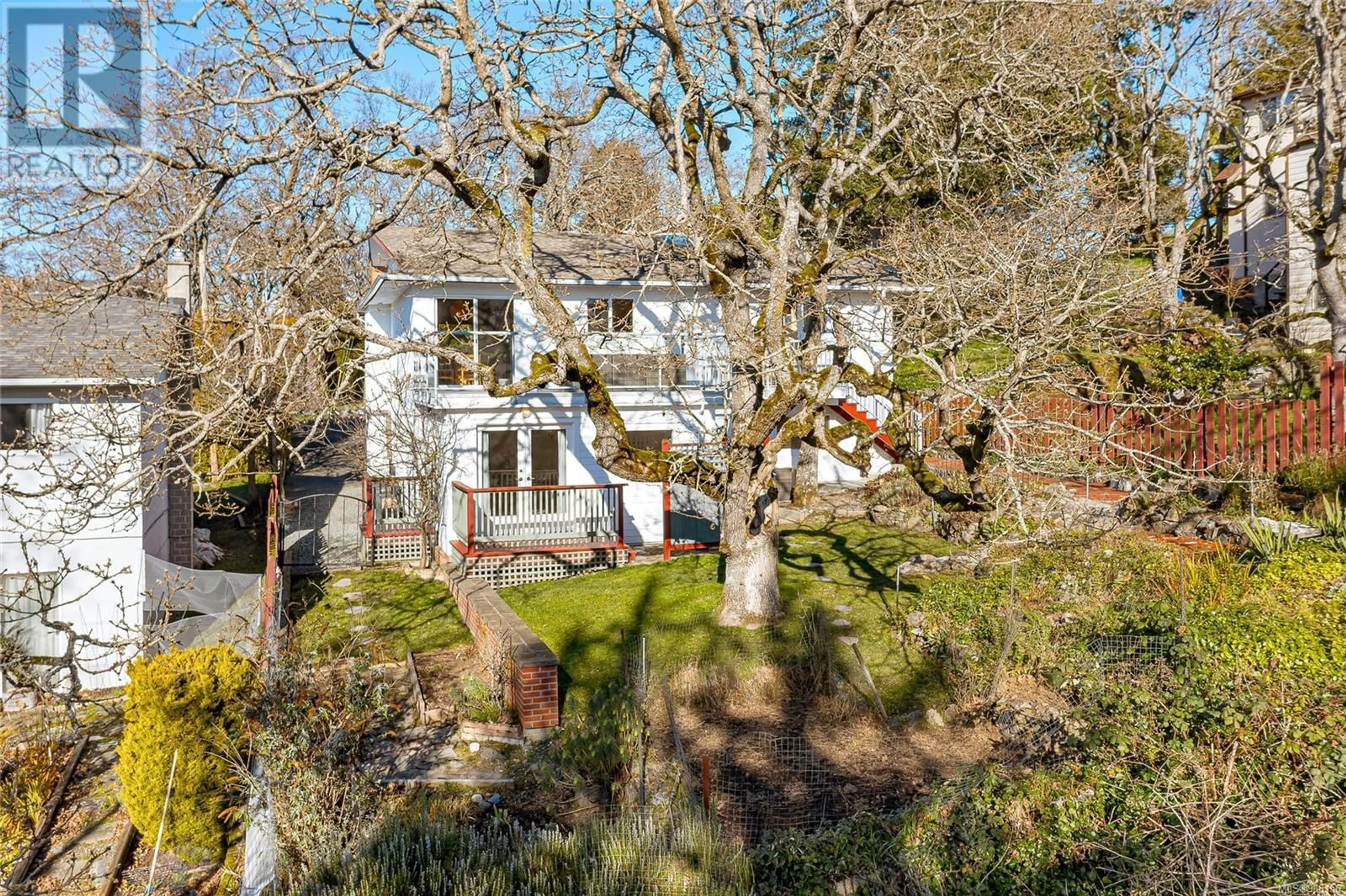 A pic from outside/outdoor area/front of a property/back of a property/a pic from drone, street for 1199 Tolmie Ave, Victoria British Columbia V8X2H7