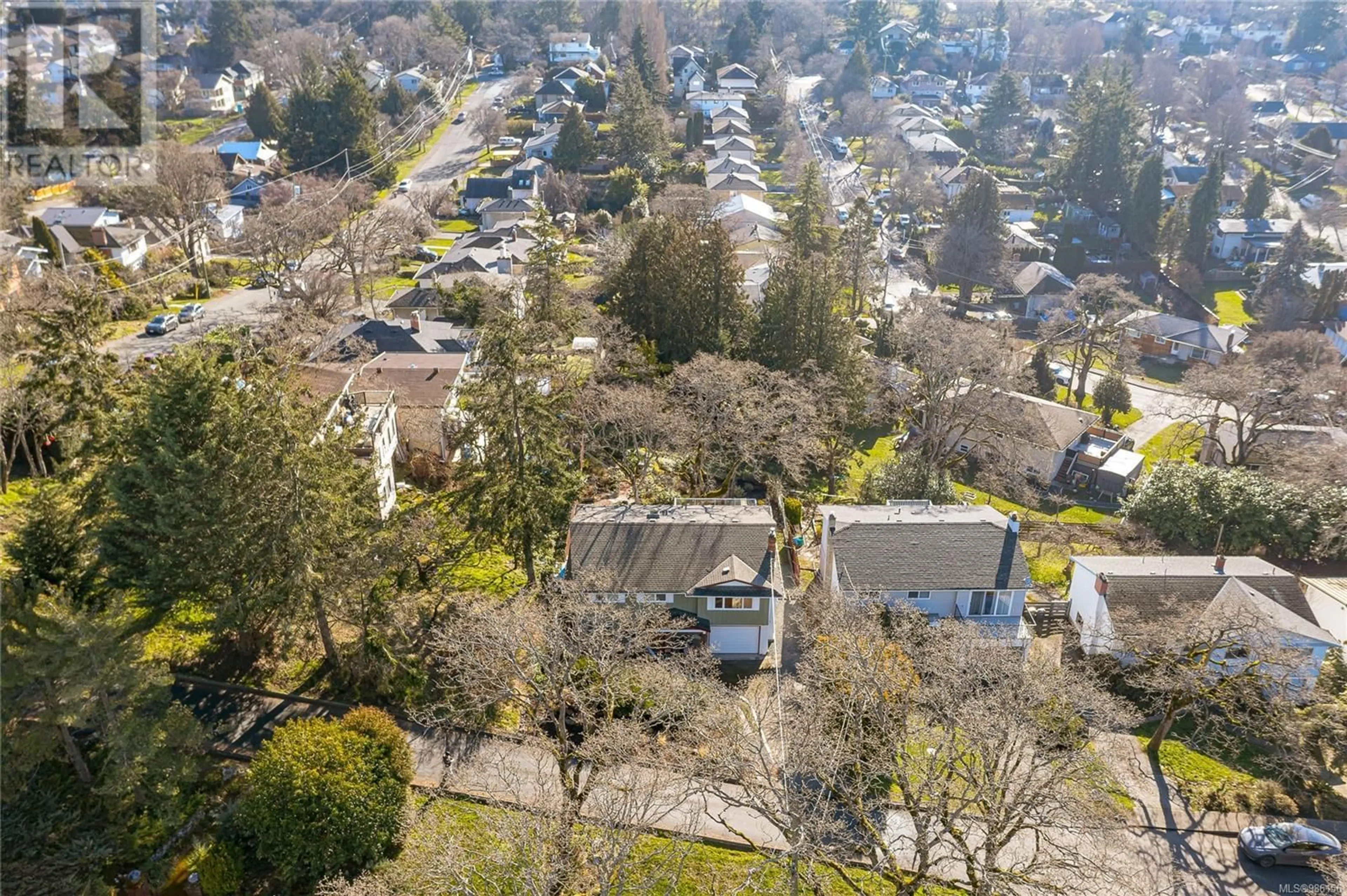 A pic from outside/outdoor area/front of a property/back of a property/a pic from drone, street for 1199 Tolmie Ave, Victoria British Columbia V8X2H7