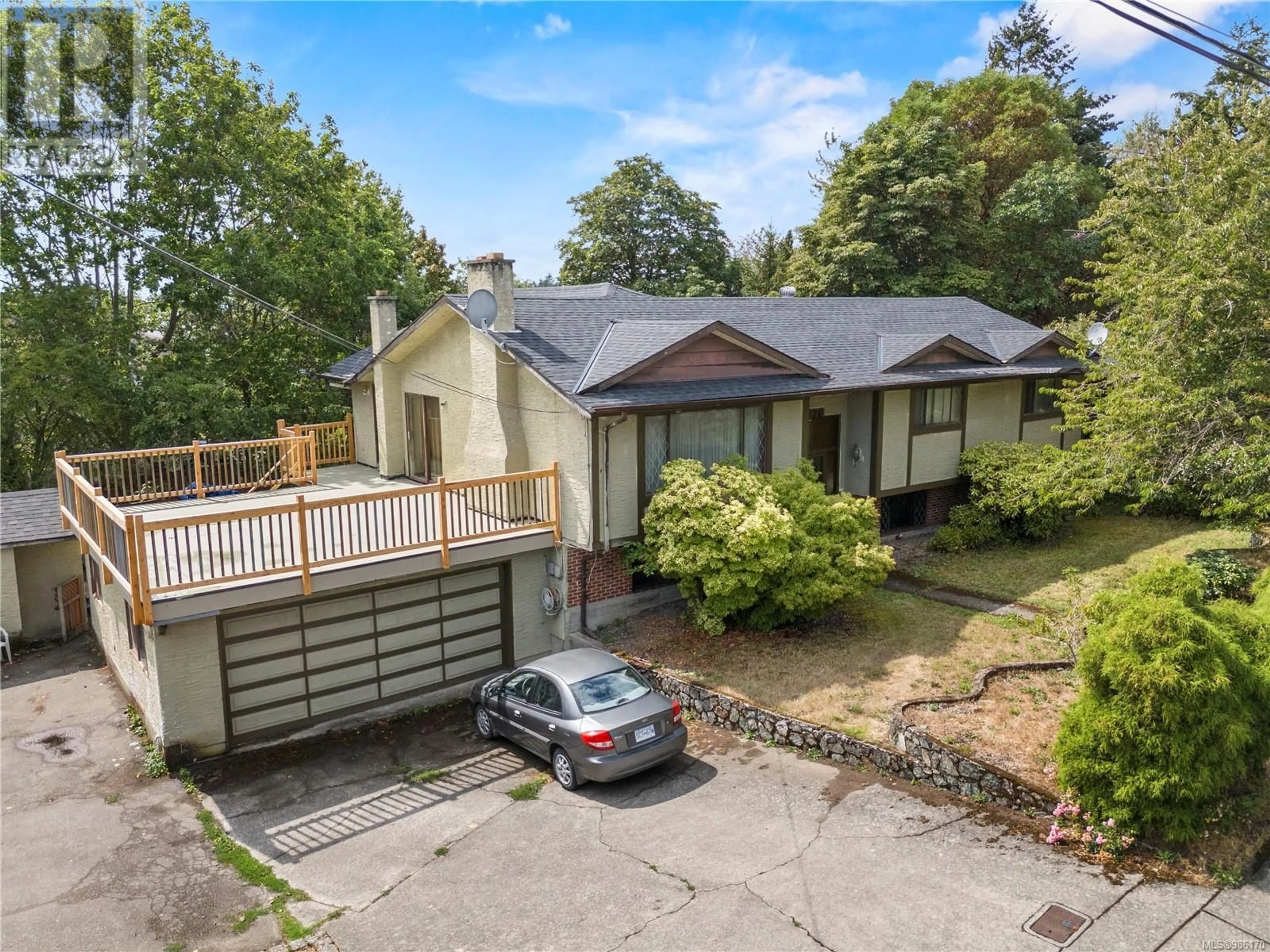 A pic from outside/outdoor area/front of a property/back of a property/a pic from drone, street for 3978 Cedar Hill Cross Rd, Saanich British Columbia V8P2N7