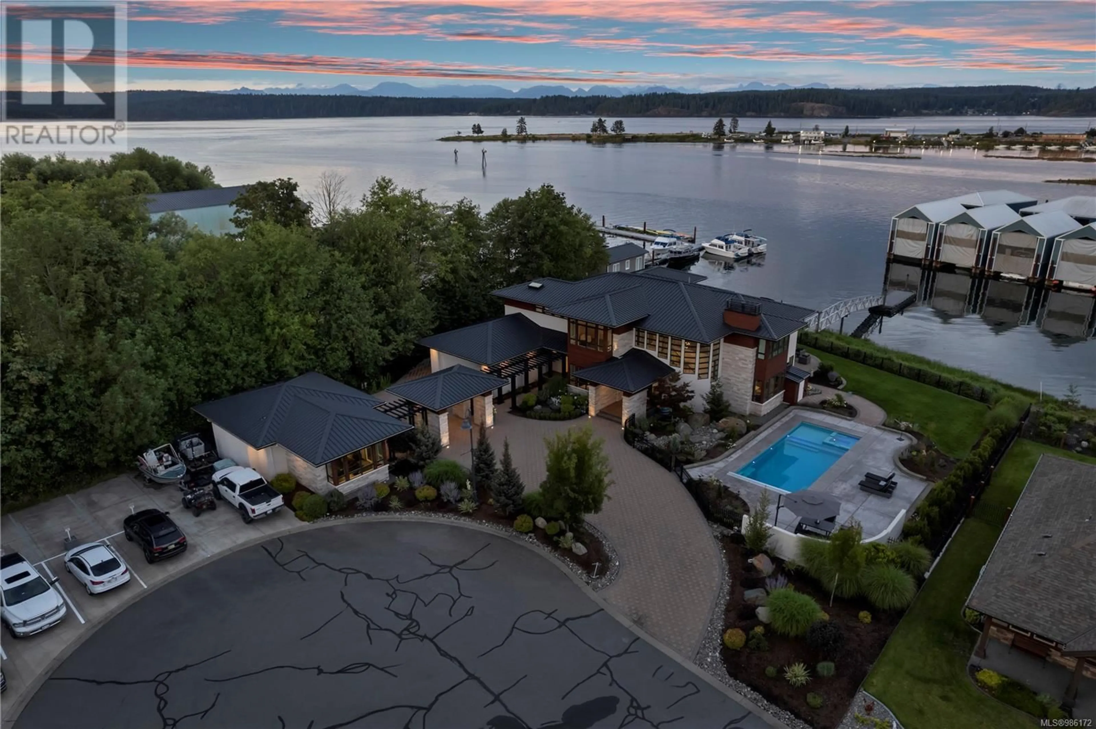 A pic from outside/outdoor area/front of a property/back of a property/a pic from drone, water/lake/river/ocean view for 2881 North Beach Dr, Campbell River British Columbia V9W0B5