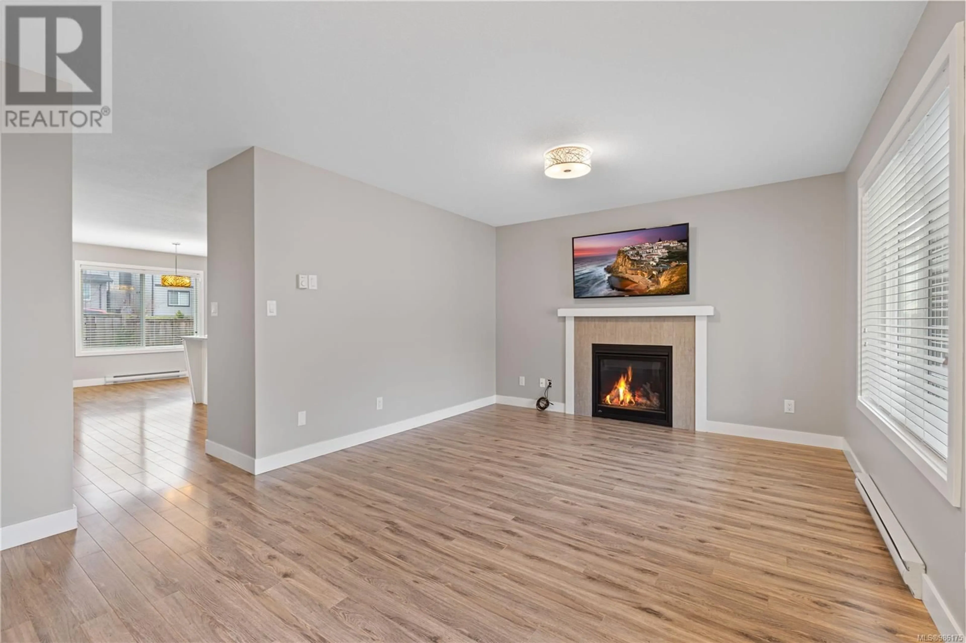 Living room with furniture, wood/laminate floor for 1158 Timberwood Dr, Nanaimo British Columbia V9R0H2