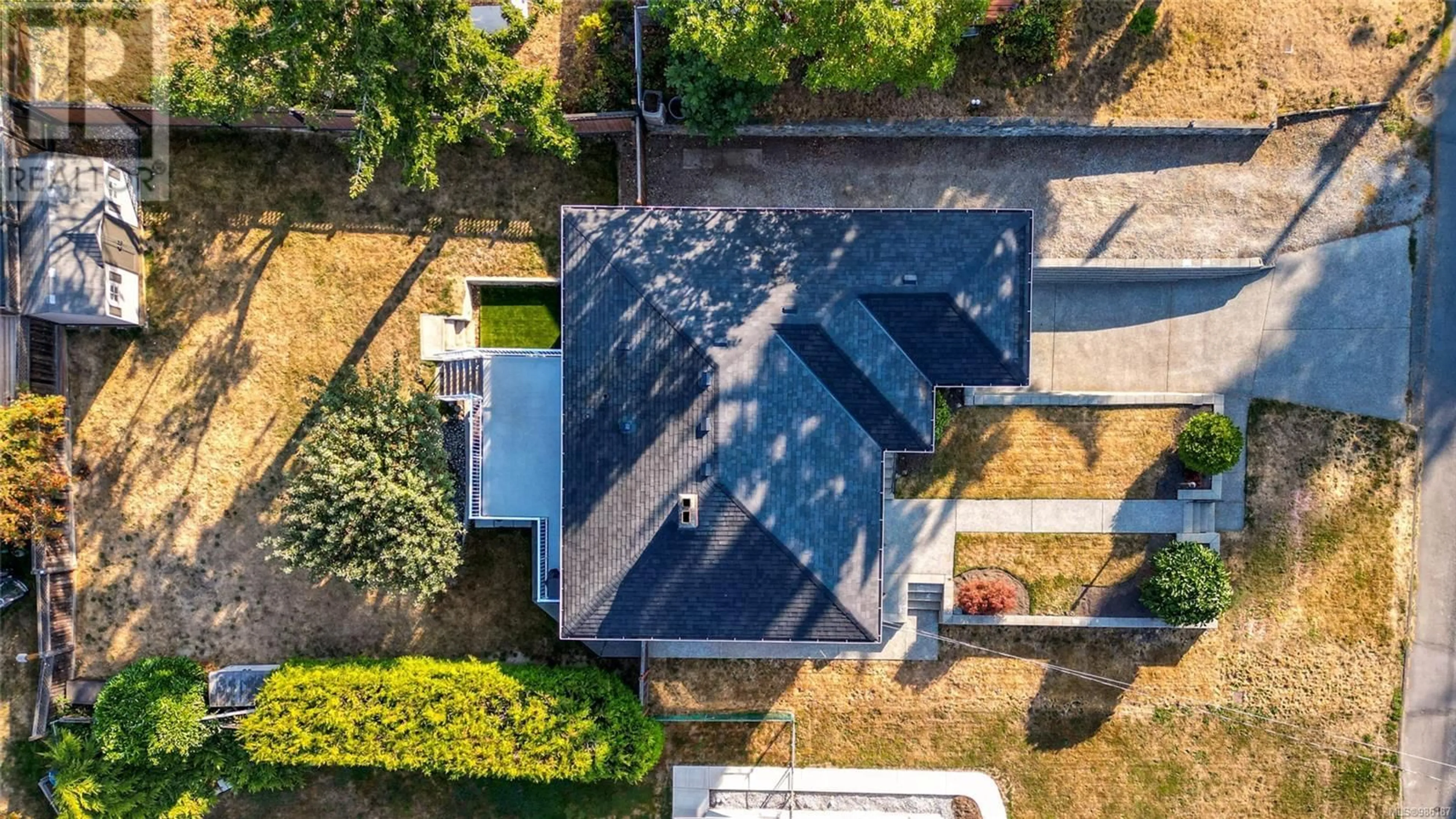 A pic from outside/outdoor area/front of a property/back of a property/a pic from drone, unknown for 240 Homer Rd, Saanich British Columbia V8Z1V9