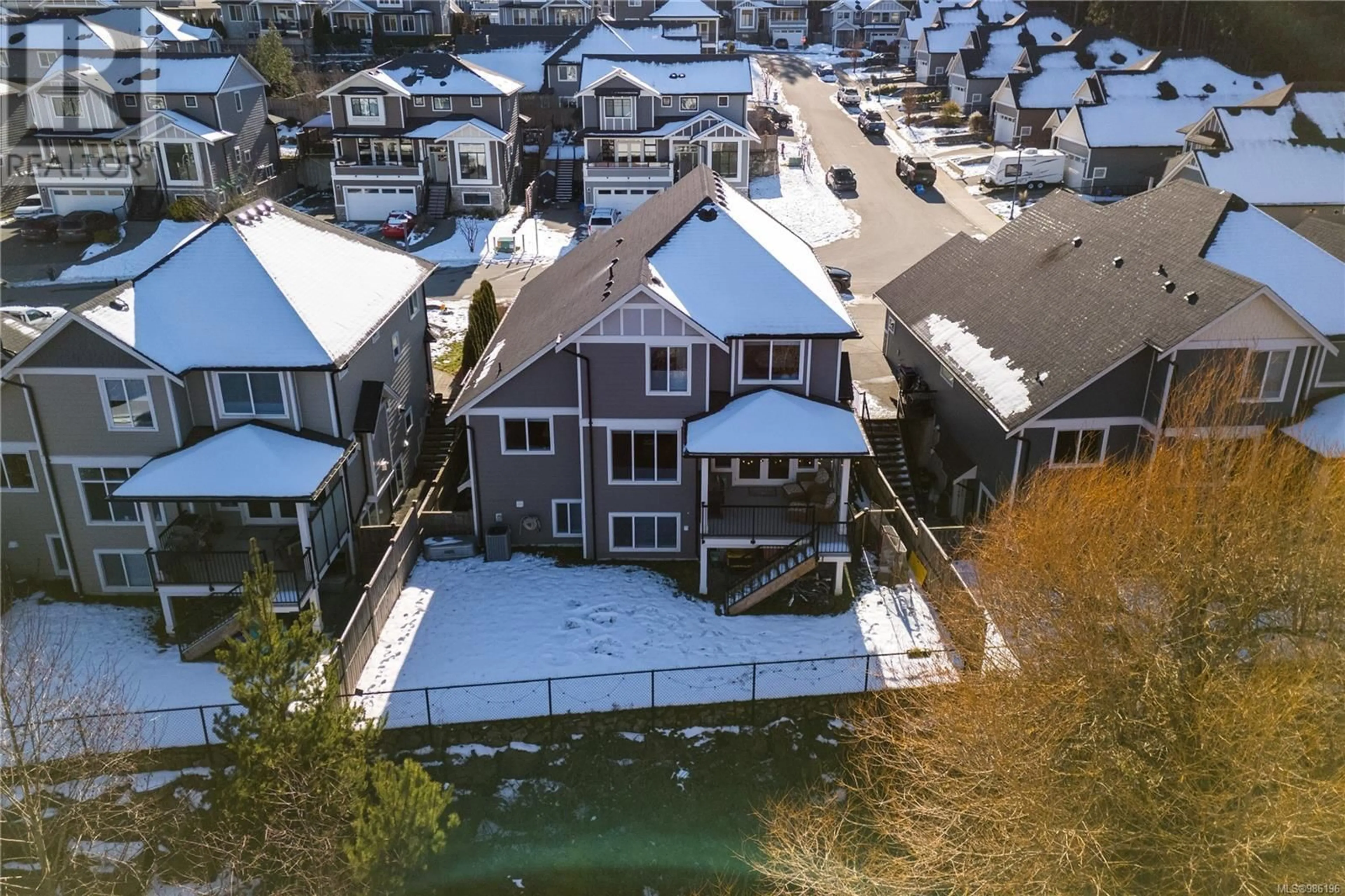 A pic from outside/outdoor area/front of a property/back of a property/a pic from drone, water/lake/river/ocean view for 3556 Paperbark Cres, Langford British Columbia V9C0L5